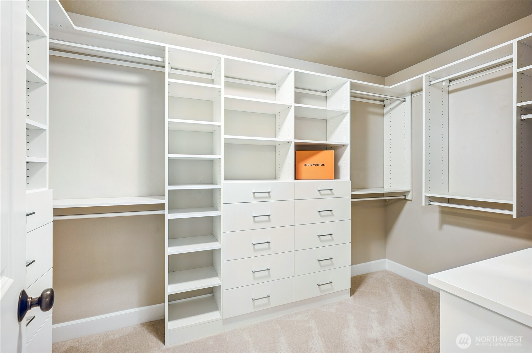 Custom California Closets bring luxury organization to your primary suite.