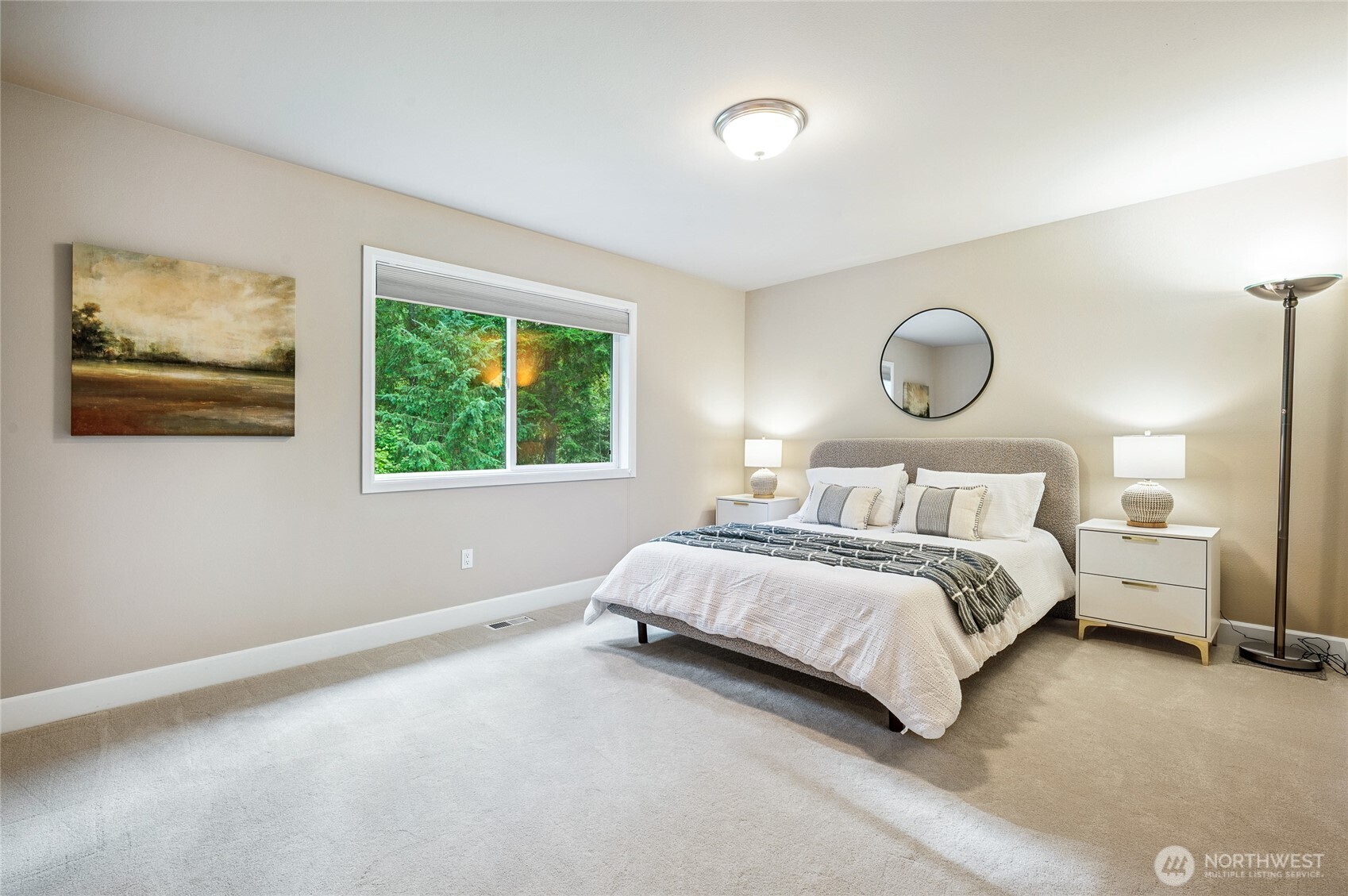 Bright and airy, spacious bedroom with walk-in closet, perfect for family and guests.