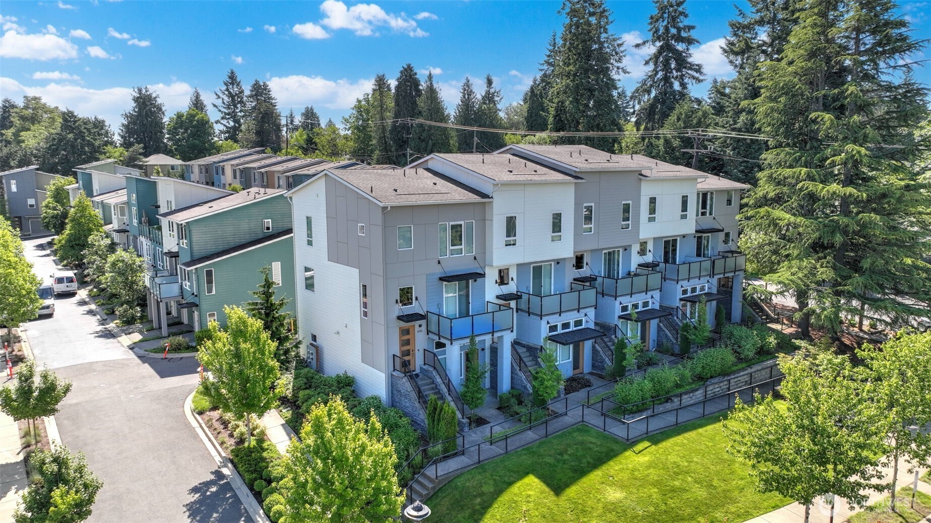 The home is located in the first building, 2nd from the end. This 5-unit building was built with a very special benefit. The street level portion has a special entrance that allows for you to conduct a business. There is a separate entrance, a ready to finish half bath and close by parking.