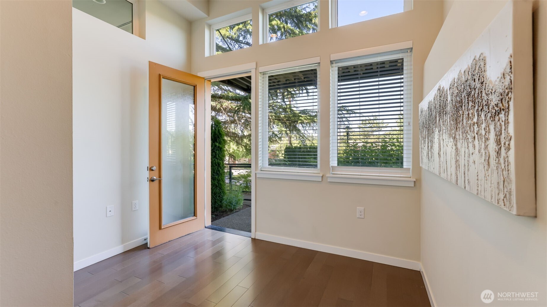 The special room has wonderful natural light and a high ceiling. This room is yours and does not need to be used for a business. It could be a work out room, a media room or a hobby room.