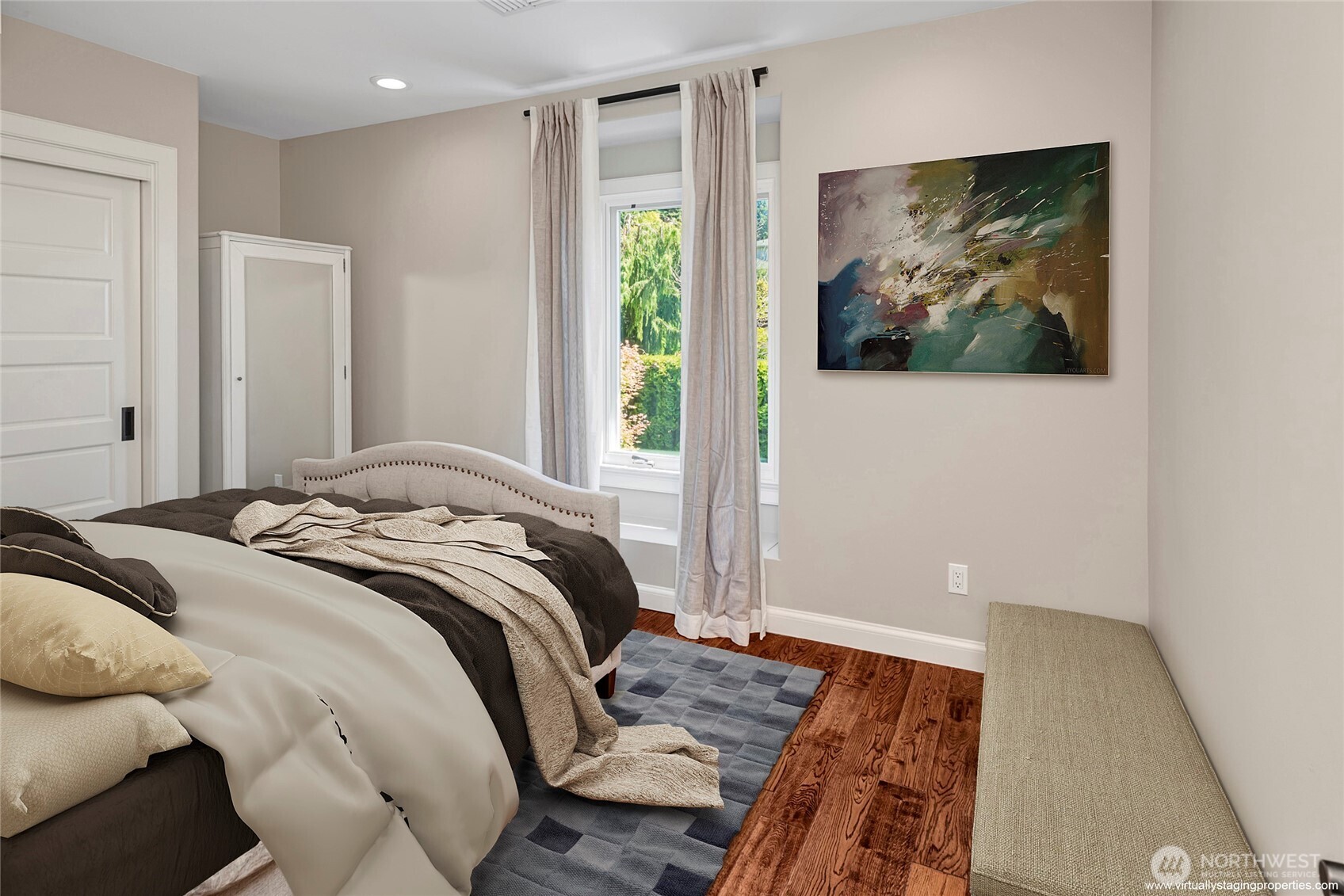Second floor bedroom with built-in closet, and window seat with views of the secret garden and beyond to the water.