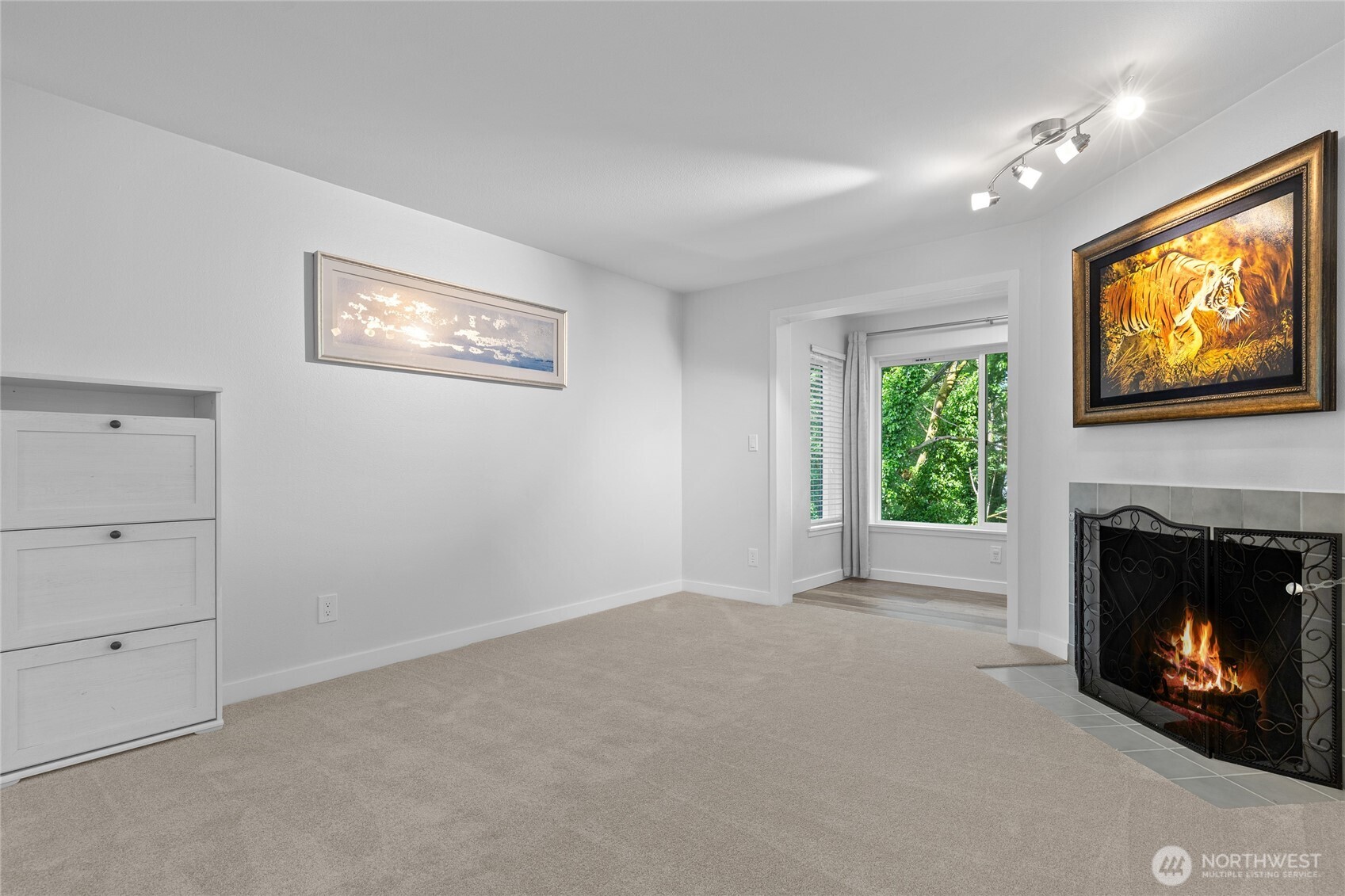 Soaring ceilings, stylish updates, and peaceful views of the greenbelt—this condo checks all the boxes!