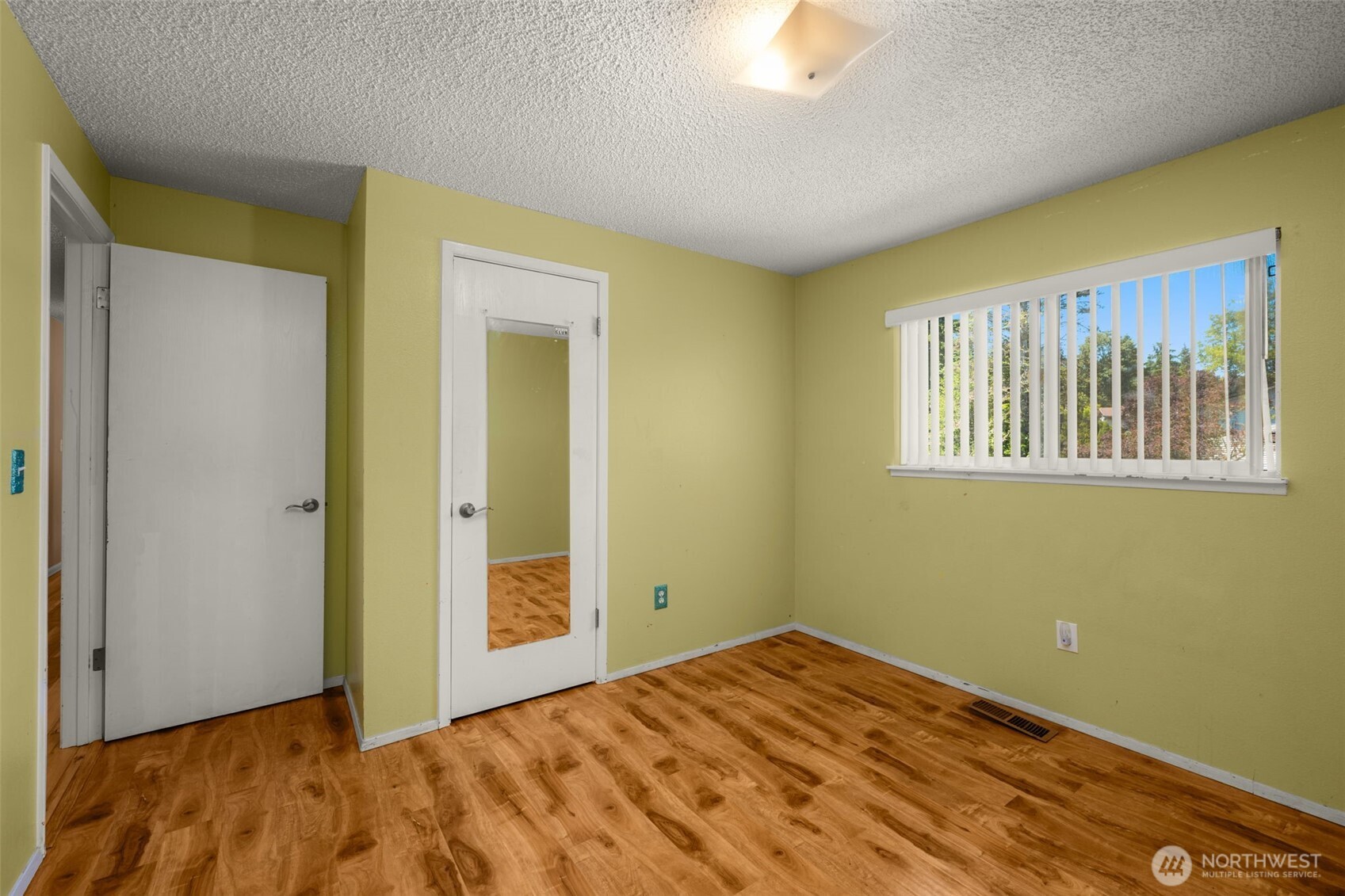 3rd bdrm: light filled room