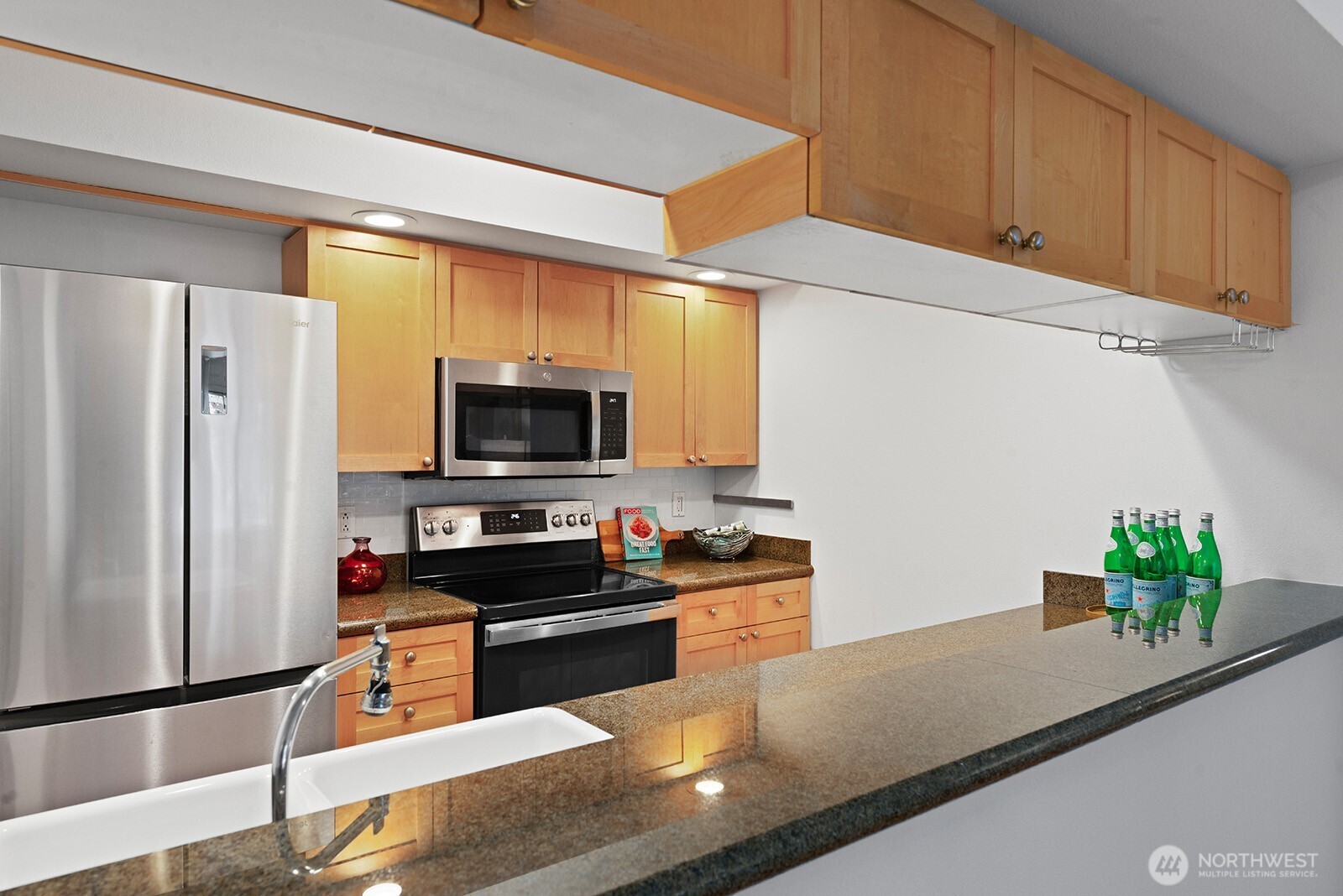 A well appointed kitchen with ample cabinets for storage.