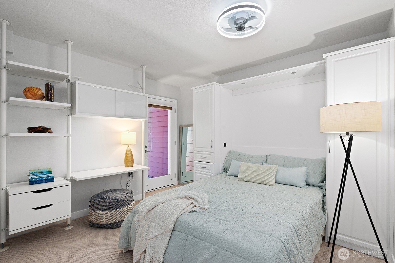 This guest bedroom has so much to offer. The Murphy bed is included and has loads of storage, the desk can also be included if you wish and the door leads to the covered patio.
