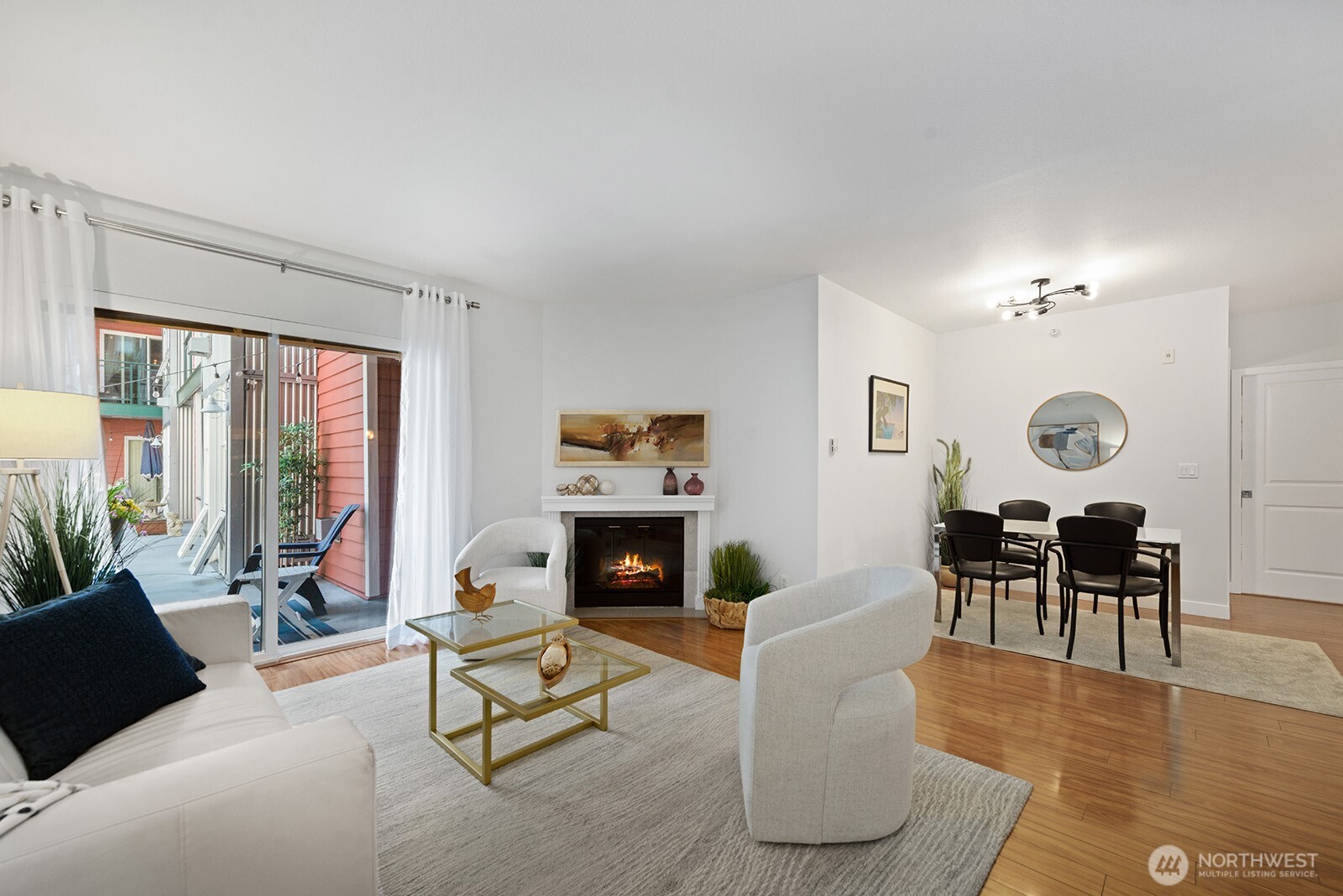 Well defined living and dining areas offer a wonderful flowing floor plan with sliding doors to a covered patio for outdoor enjoyment.