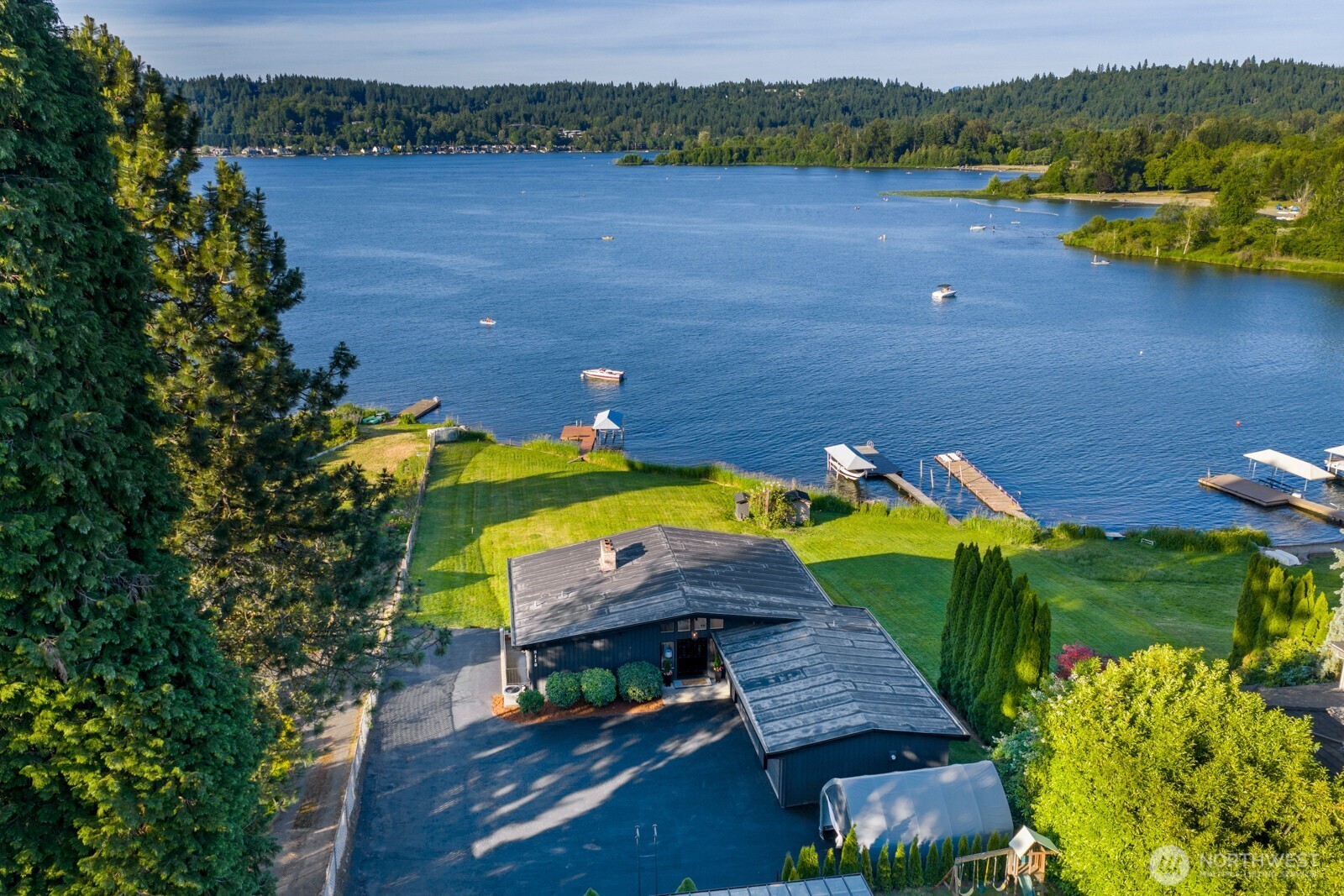 Drone shot from street facing the lake