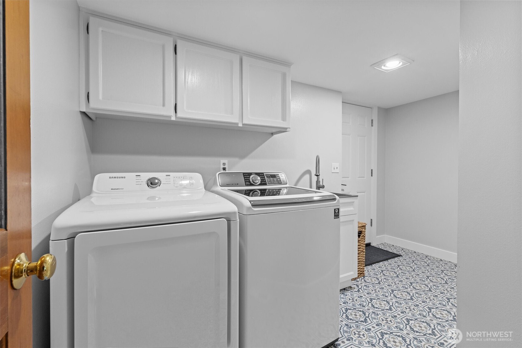 Laundry rooms in many homes are lost spaces with hardly any room to operate. Surely not the case here! This ample space doubles as a nice-sized laundry room AND a convenient mud room that connects the home to the garage.