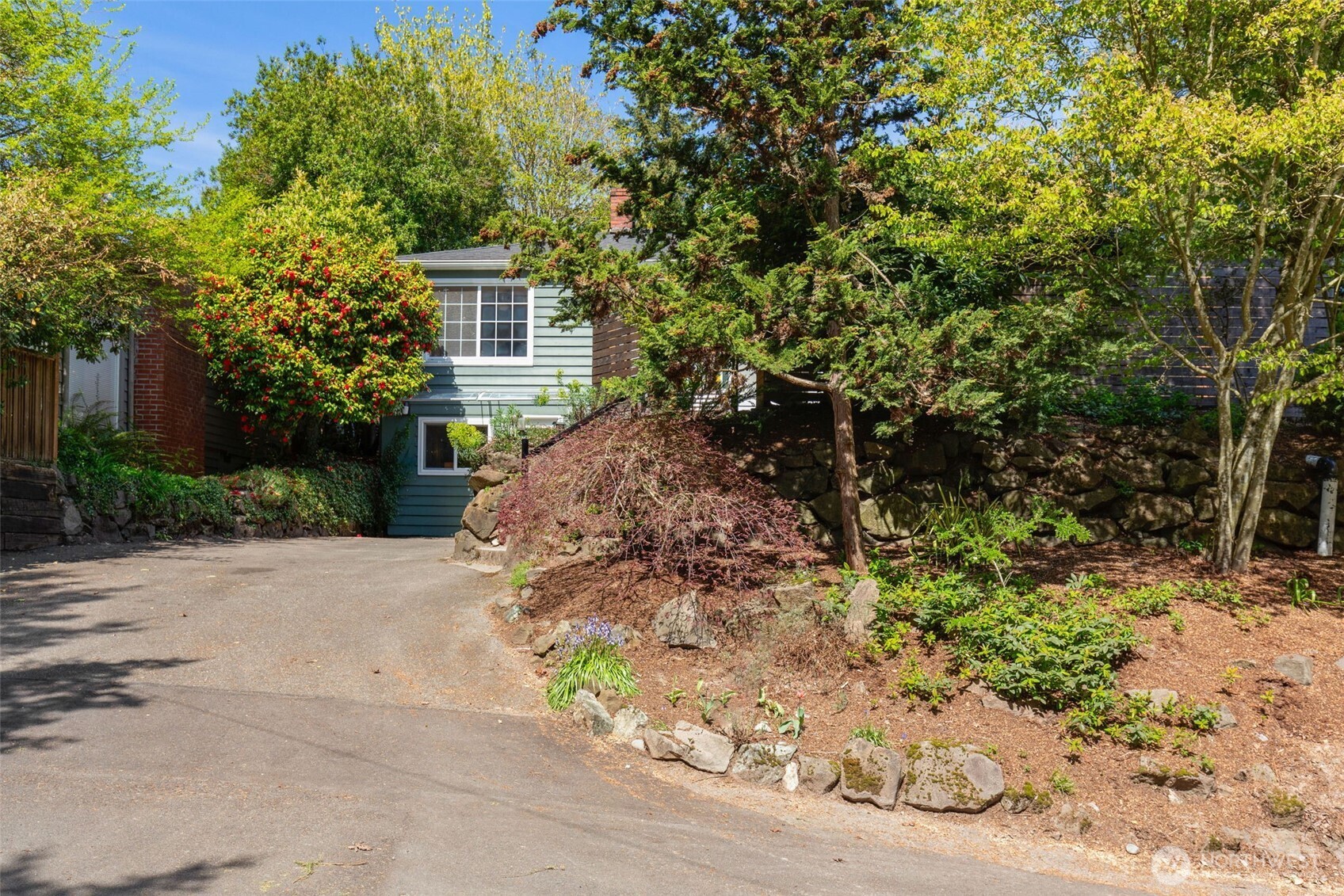 2 or more off-street parking spots! Lovely, verdant location.