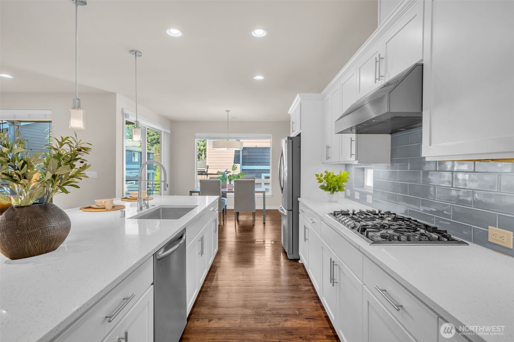 Grand kitchen with ample cabinet and counter space.