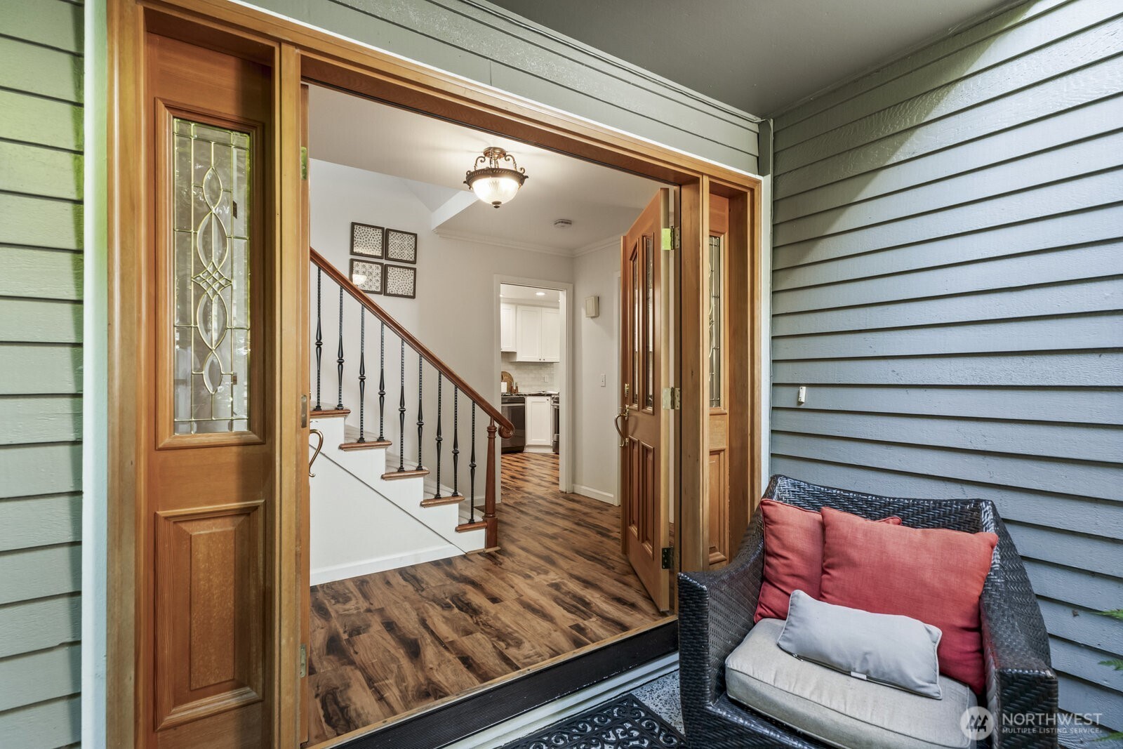 Double door entry and front patio/courtyard.
