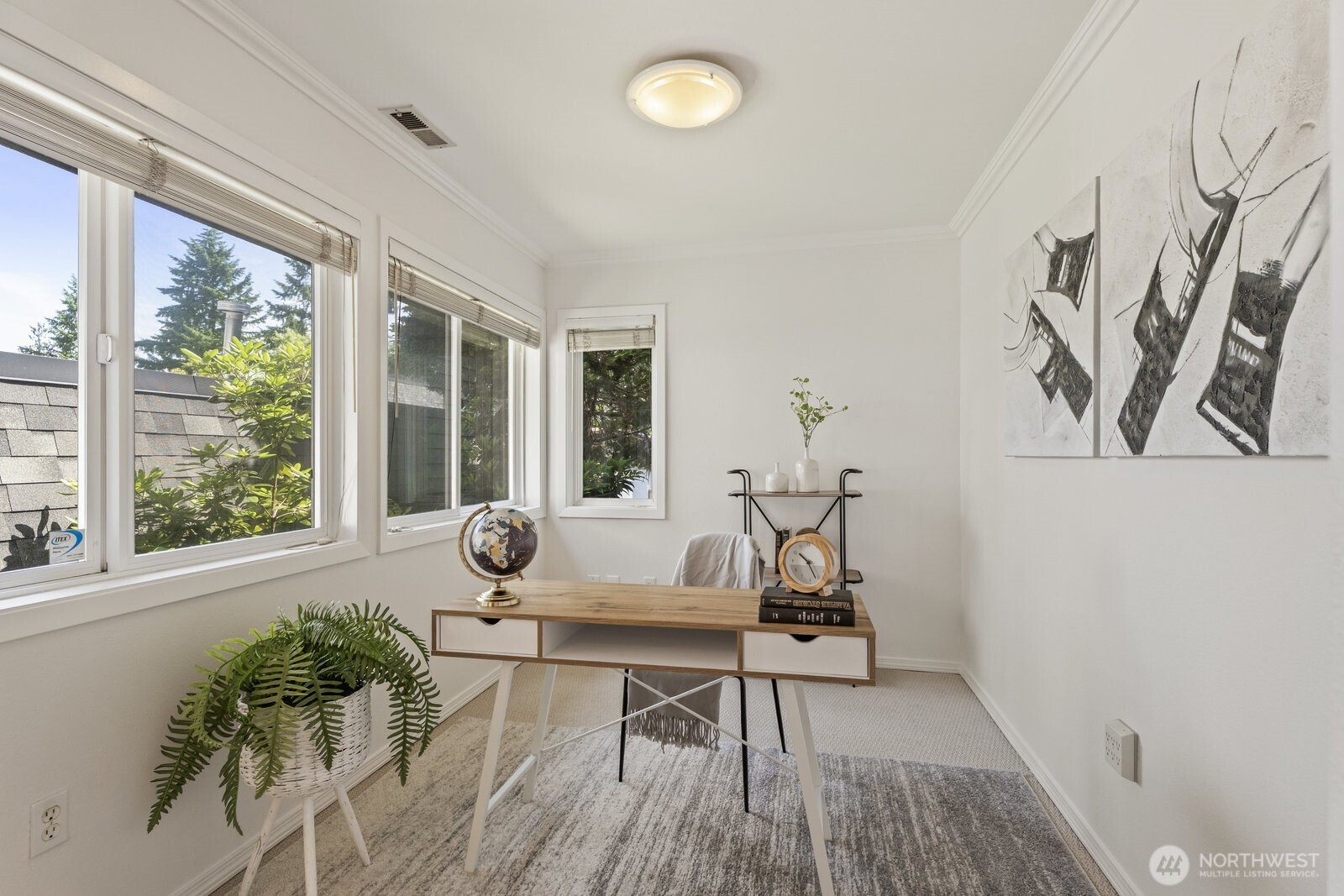 Adjacent office/den bathed in natural light.