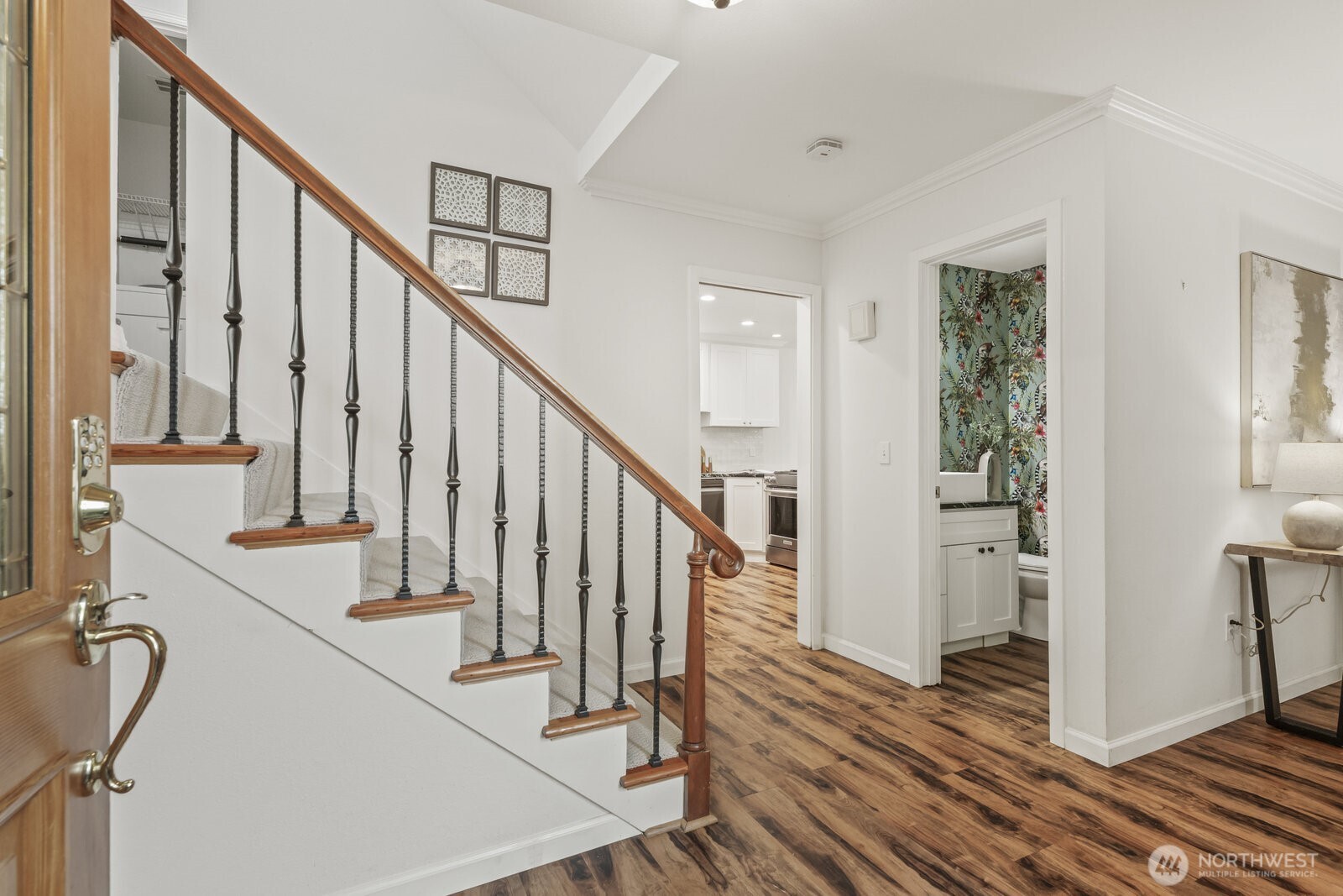 Opening into a welcoming foyer and open-concept main floor.