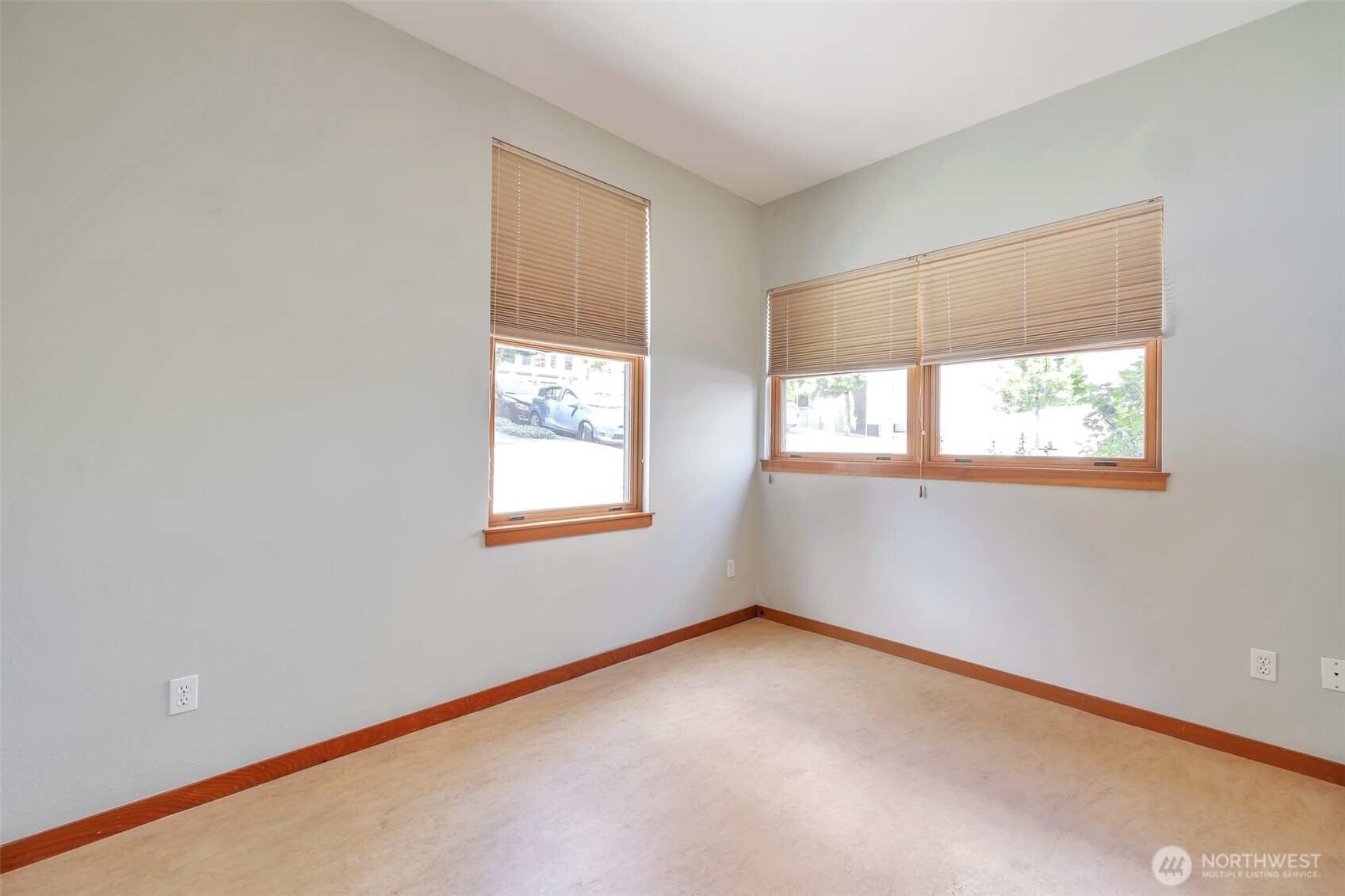 Guest bedroom could also function as a private office space or den room.