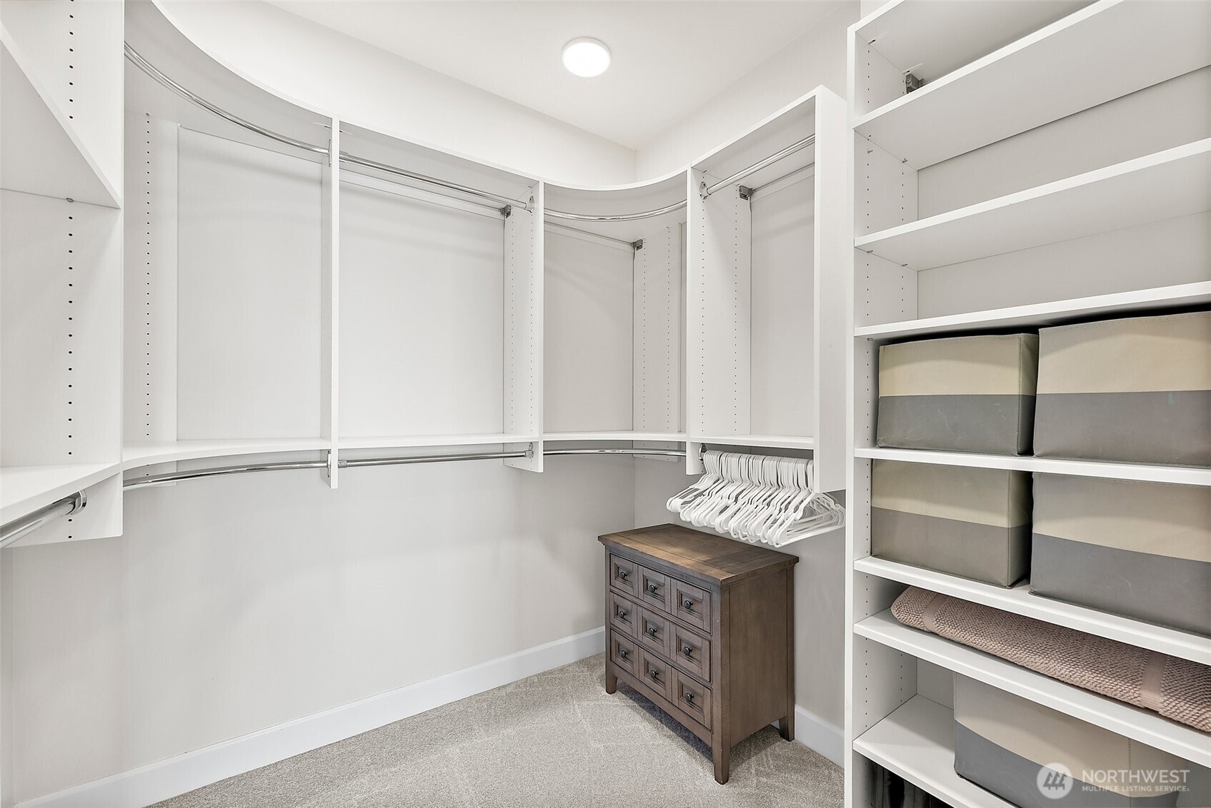 A view of the spacious second bedroom with ample closet space.