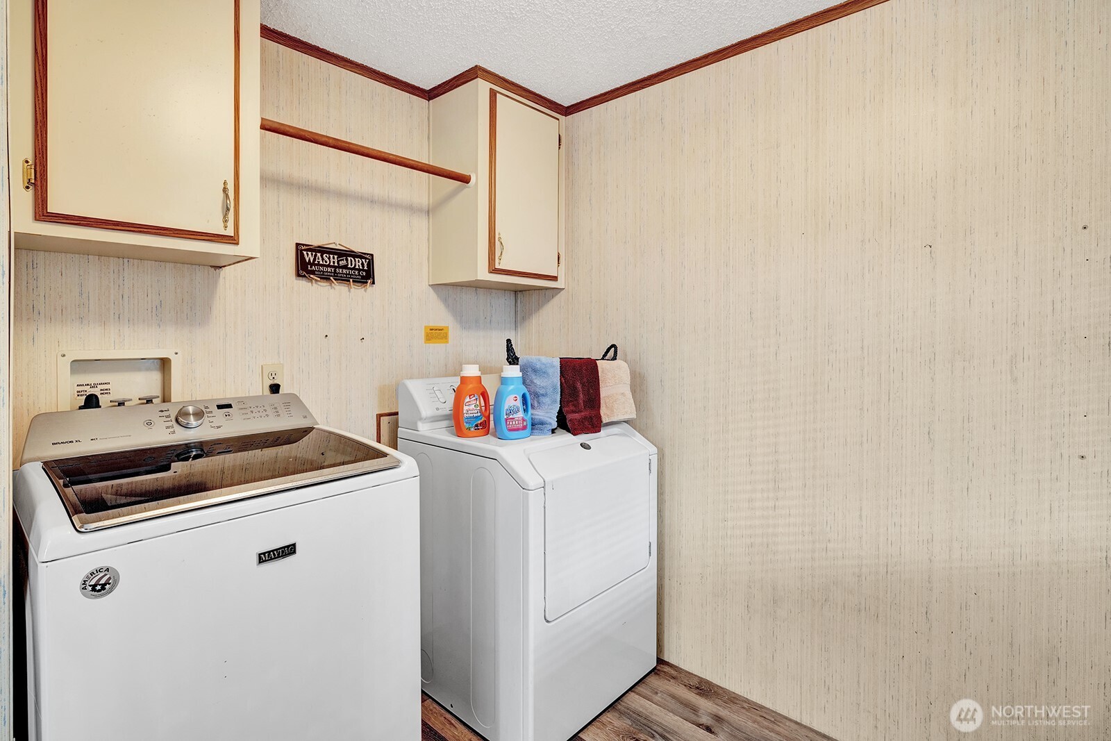 Utility room is HUGE!! Built in drying rack. New flooring Room for folding table, additional storage. freezer. Newer washer and dryer stay for your convenience.