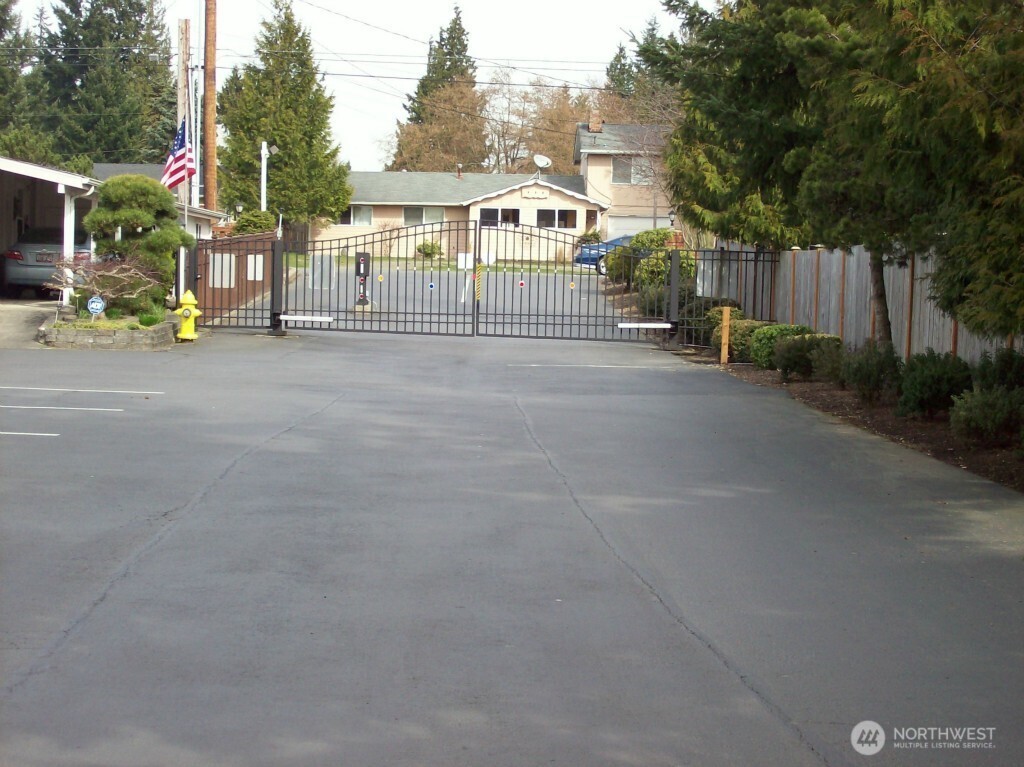 Gated Entry for vehicles and a small access gate for individuals.