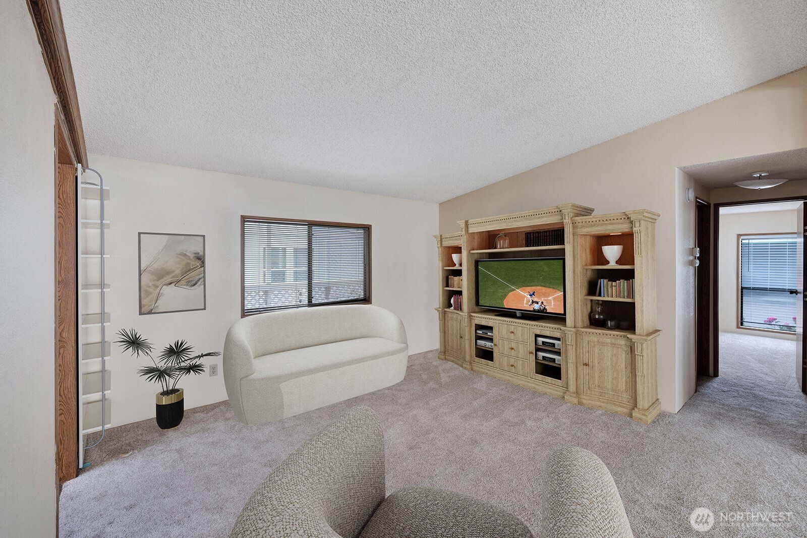 Family room area off the kitchen. Space for BIG screen TV and an entertainment center for all electronics etc.