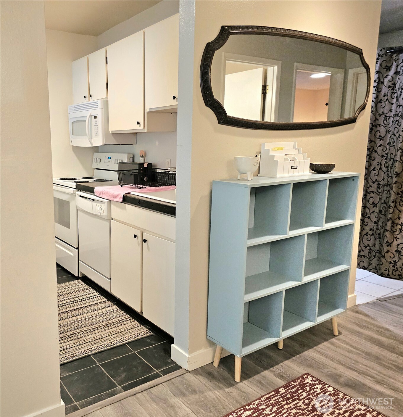 Around the hallway is the kitchen.