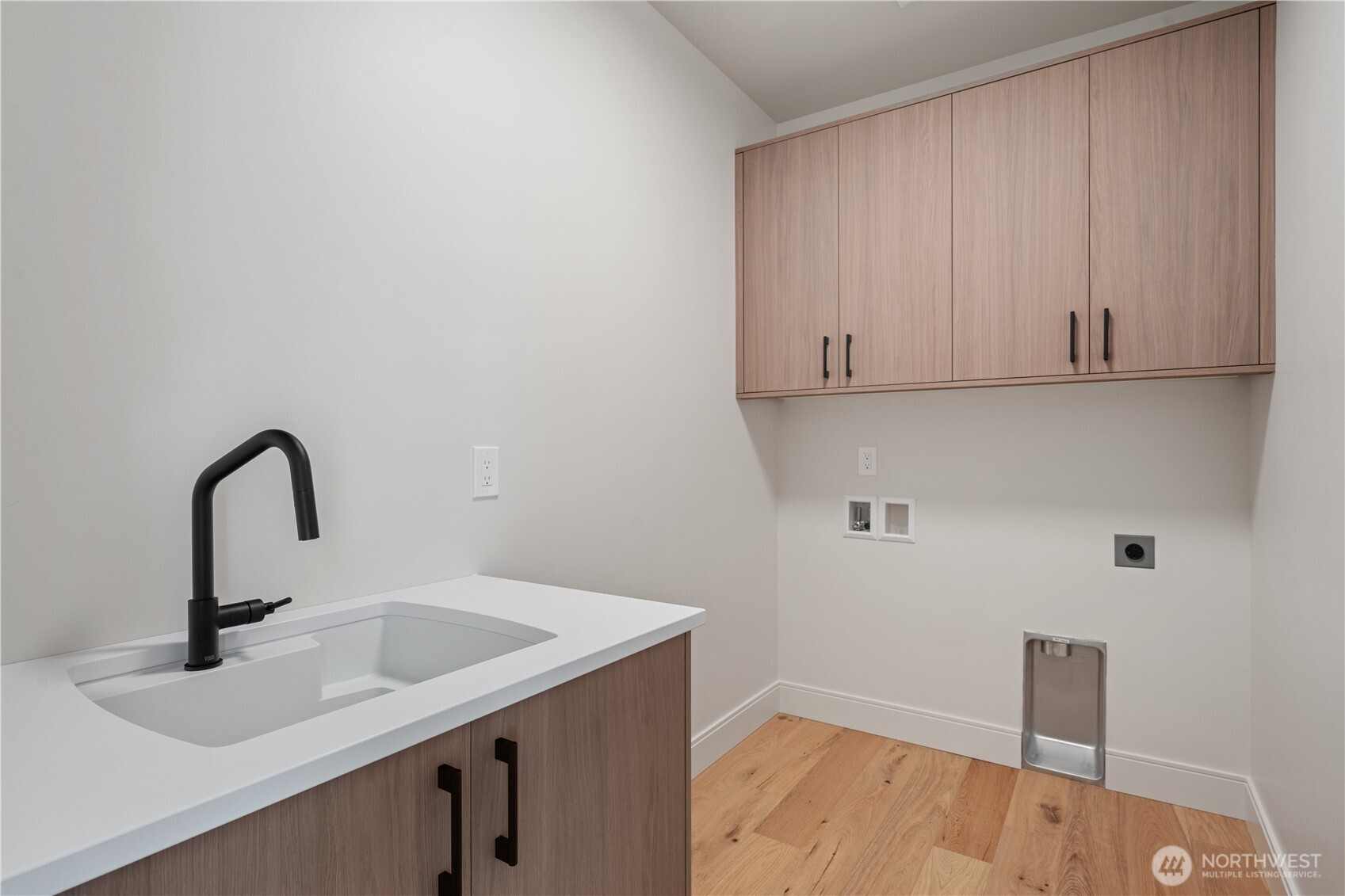 Handy utility sink in upstairs laundry