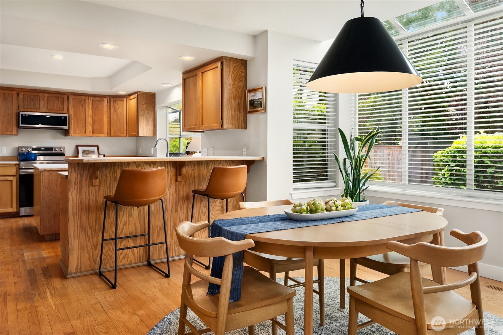 Kitchen with eating. Atrium windows offer the perfect light.