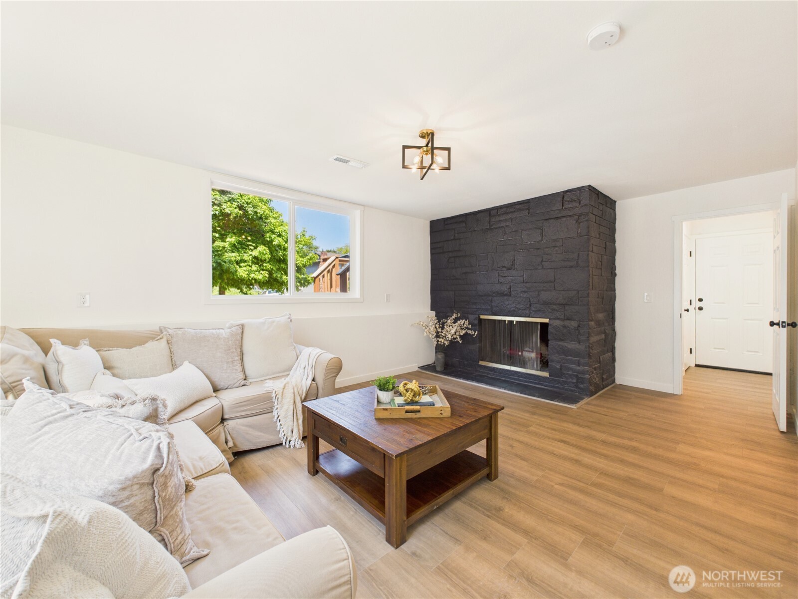 lower family room with fireplace