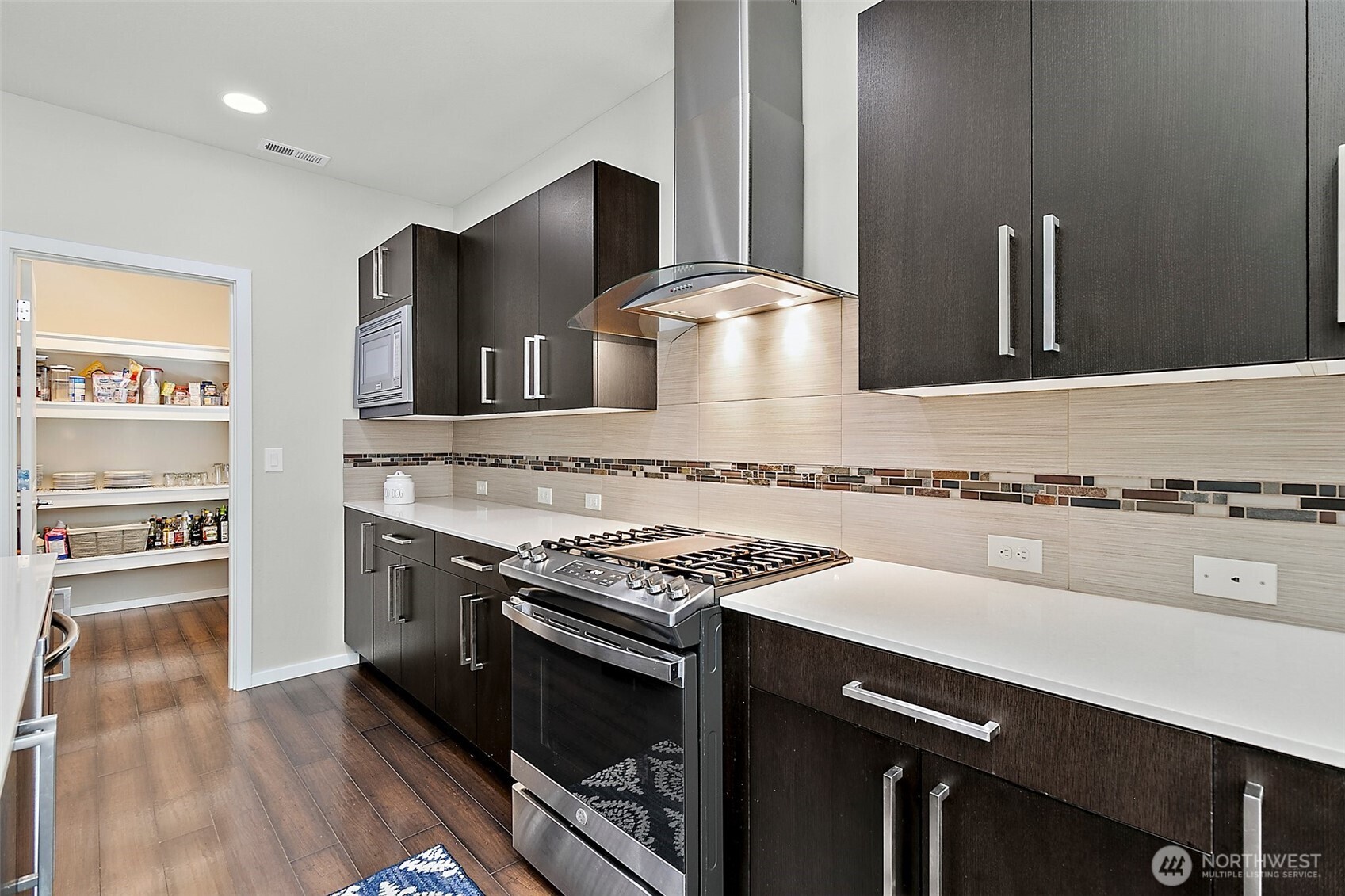 Large walk-through pantry off of kitchen.