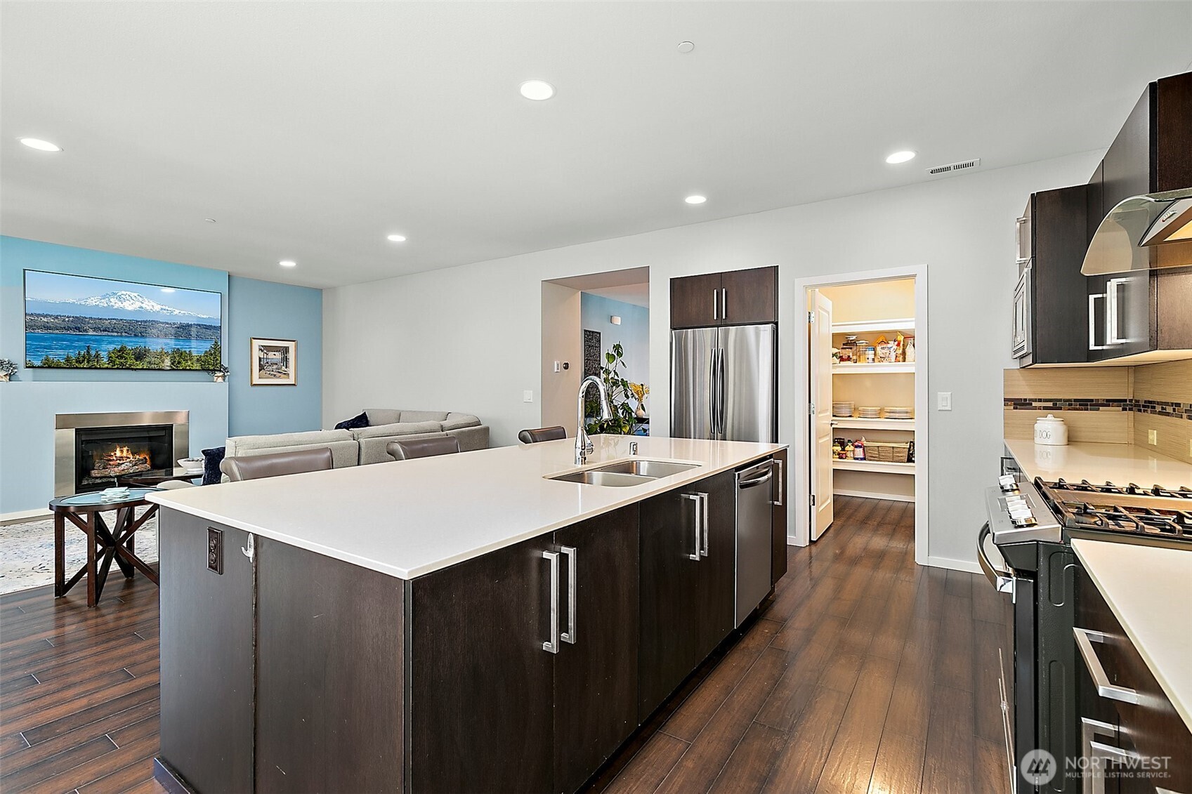 True open-concept family room / kitchen / dining area.