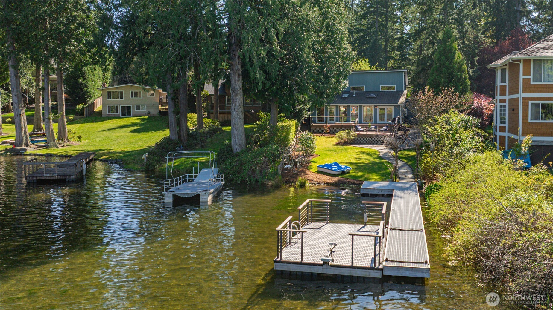 View of home, barge and dock.
