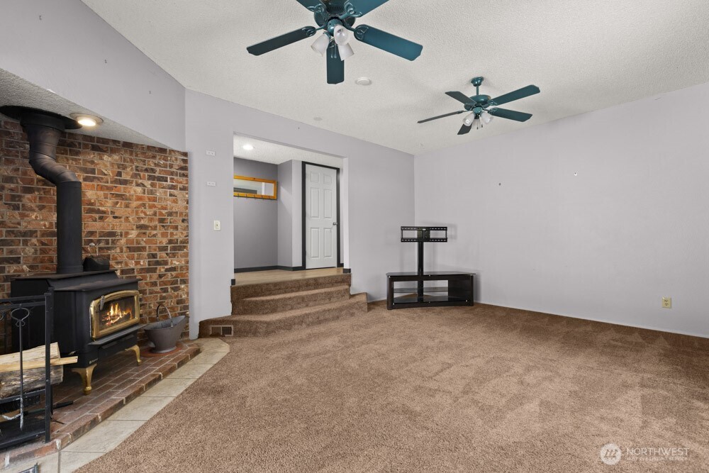 With a wood stove in the rec room, you’ve got that toasty, cabin-in-the-woods vibe—without ever leaving home.
