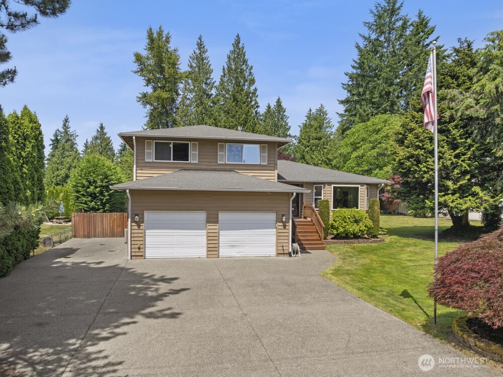 This tri-level home offers space & garage power that's hard to find!