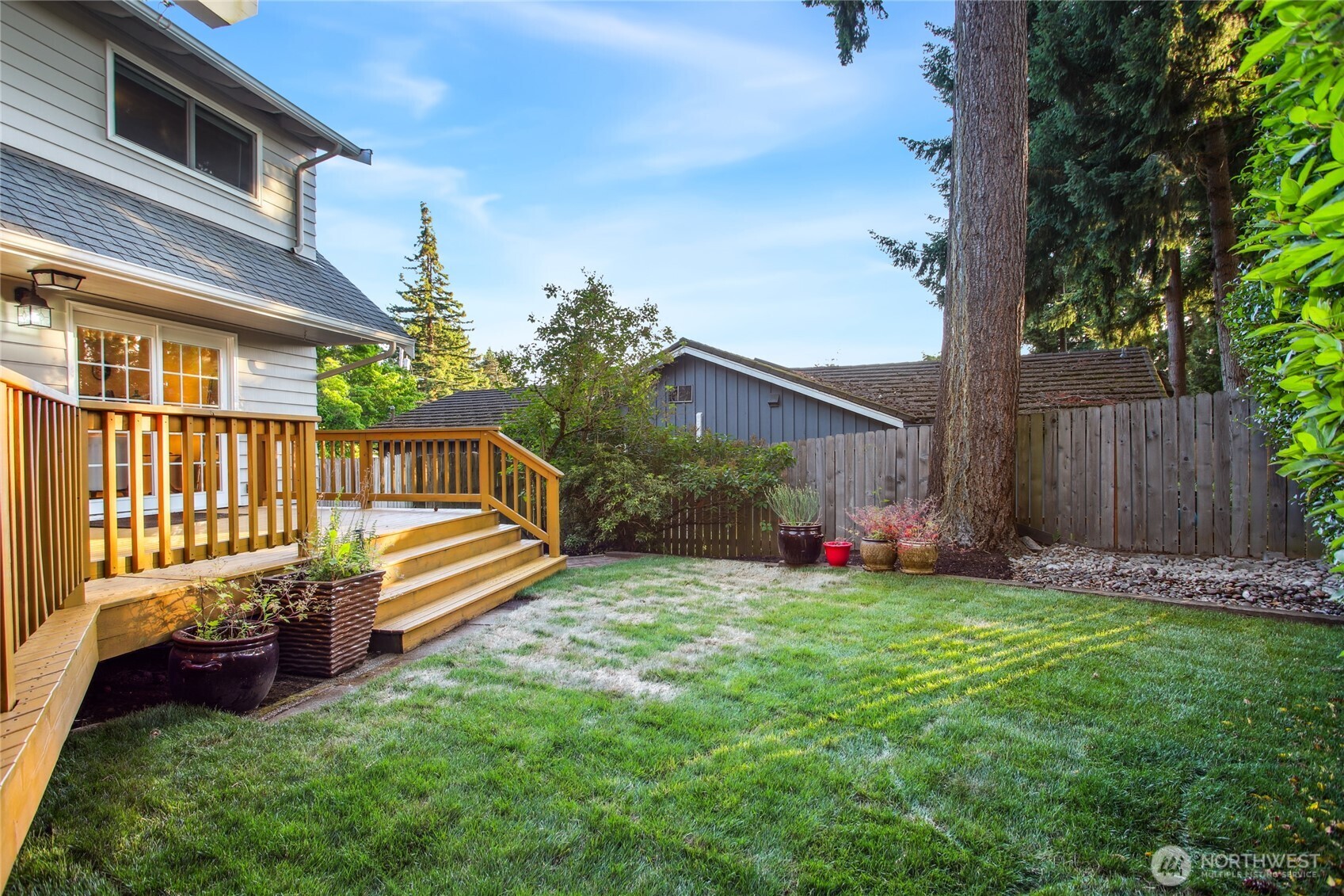 Fenced yard perfect for pets, garden and play.