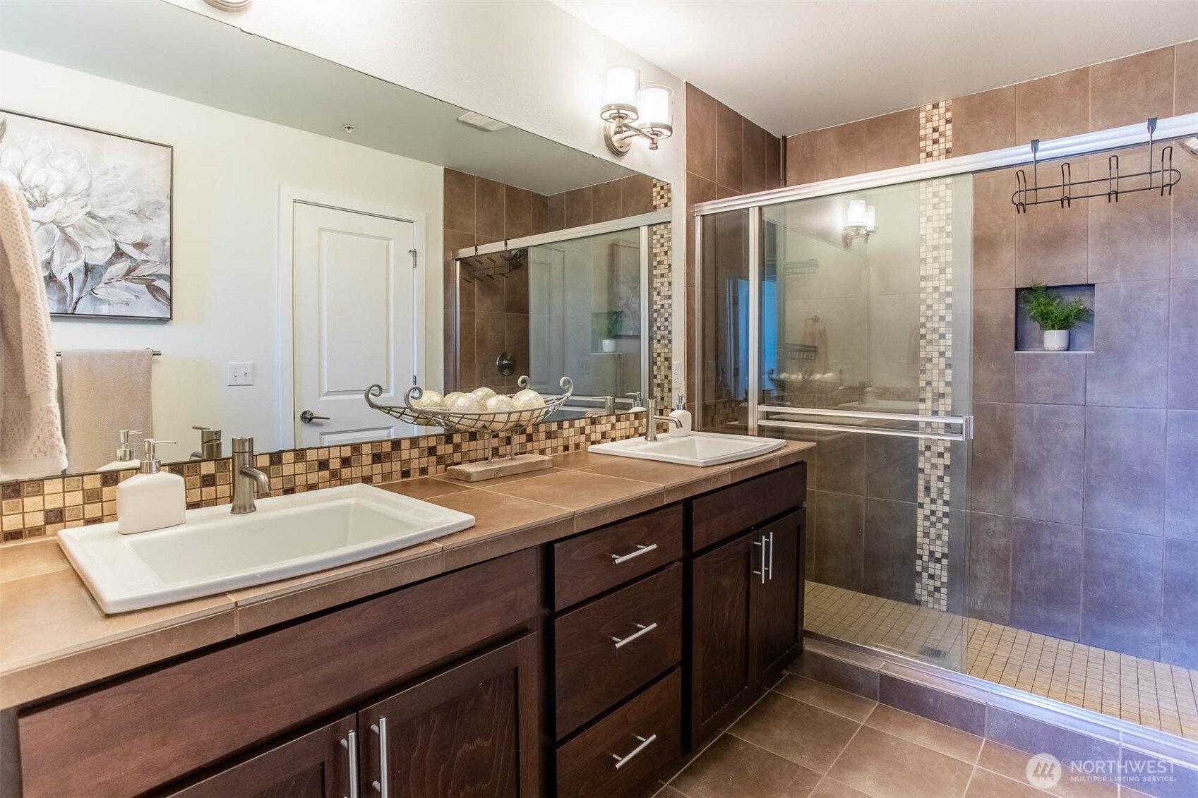 Spacious Primary Bath with Beautiful Tile work.