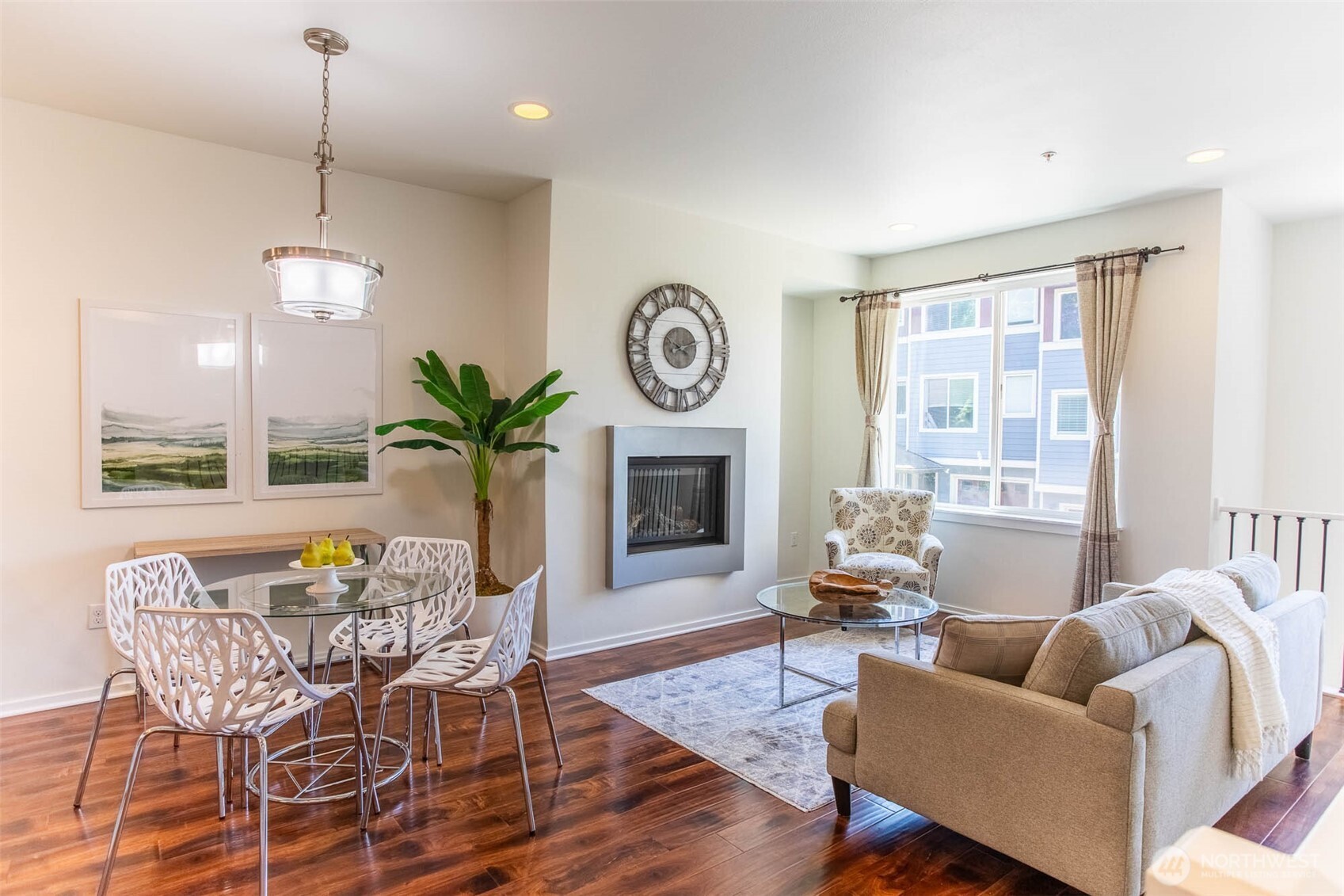 Cozy Living Room with Gas Fireplace. Notice the beautiful Walnut Flooring.