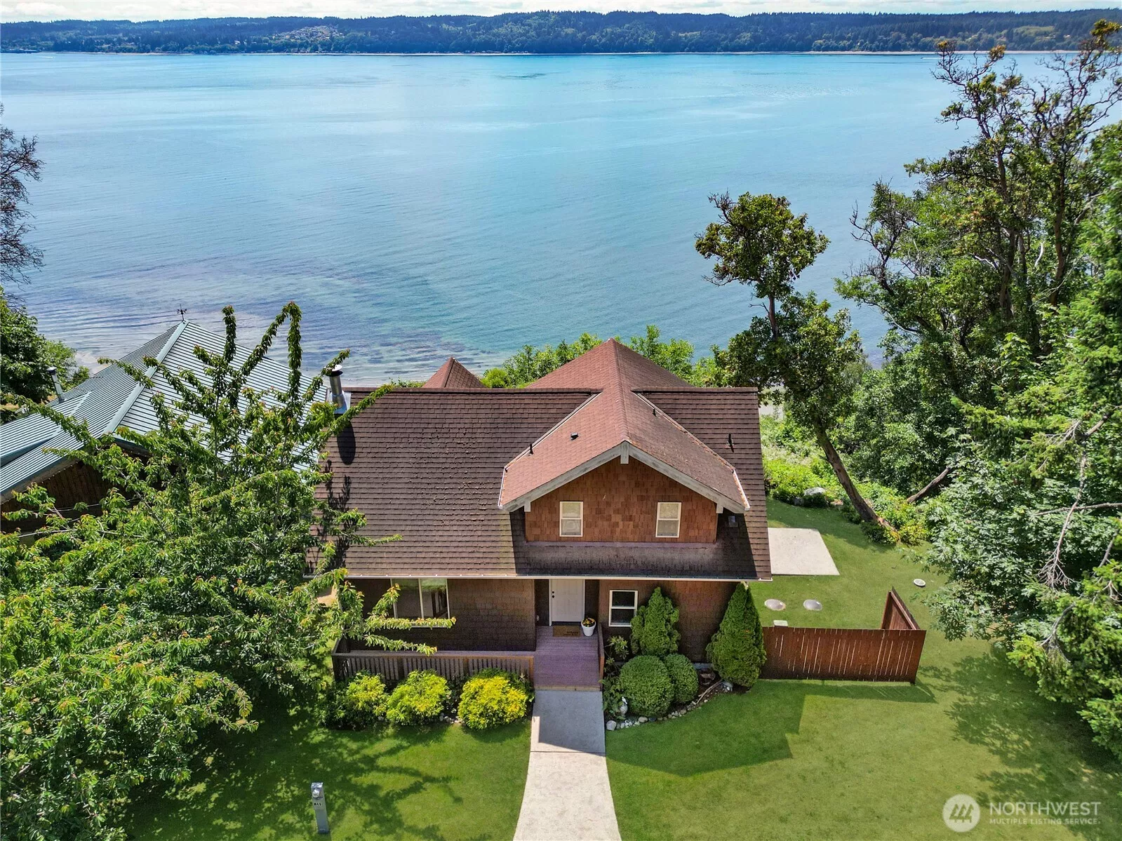 Gorgeous views from living room, dining room, kitchen, both bedrooms, and decks on both levels.