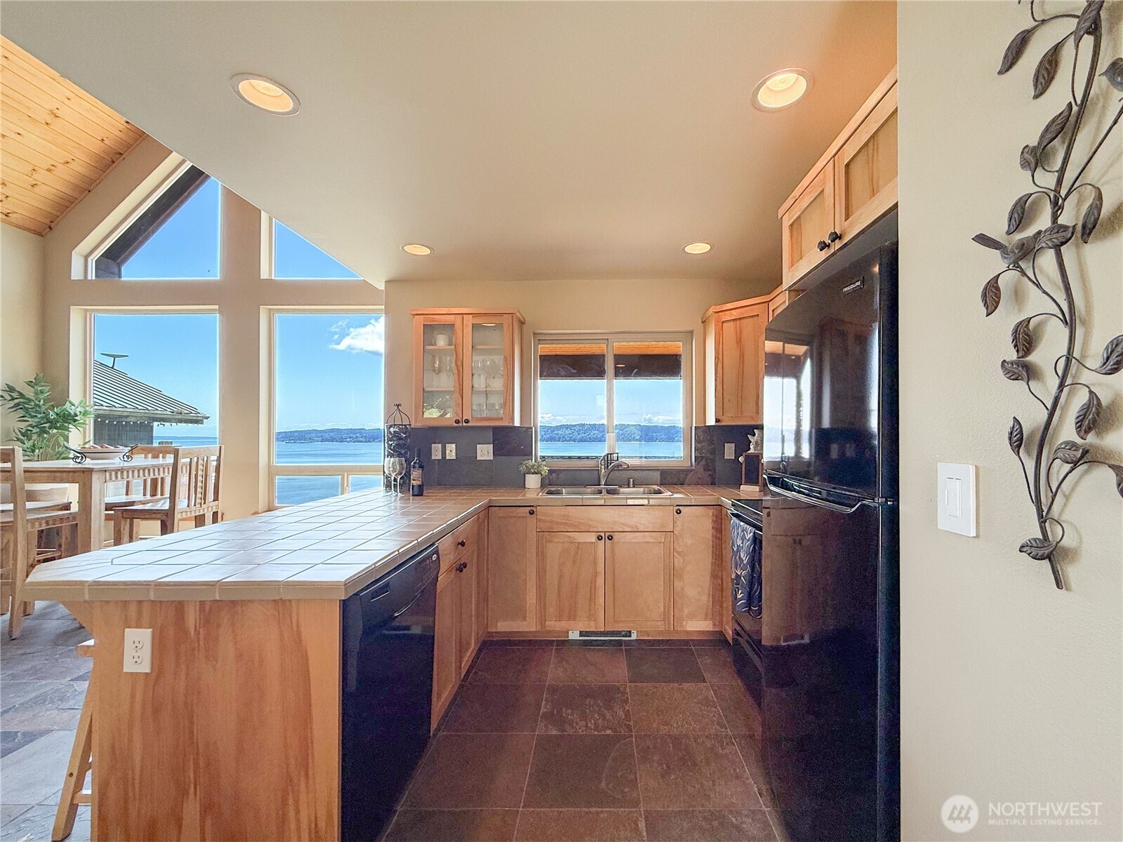 Dining room overlooking Sound and mountains.