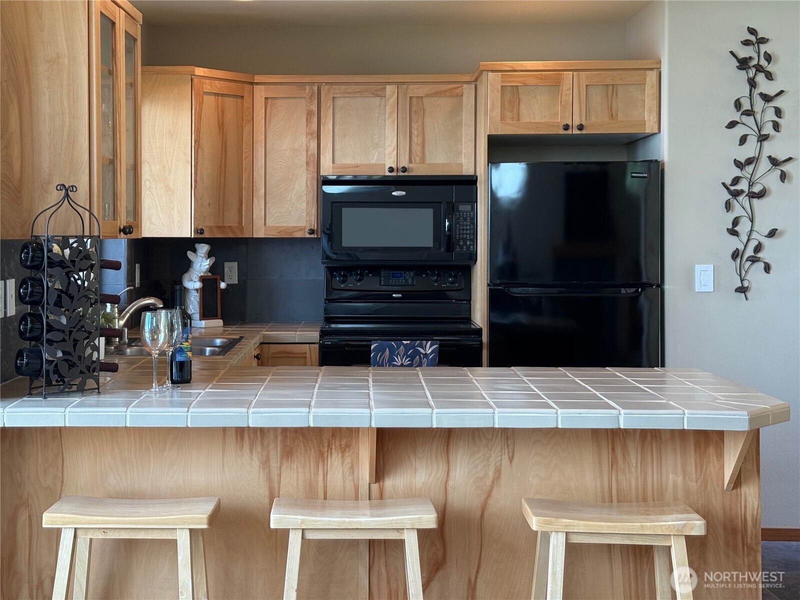 Beautiful West facing home with decks on both levels.  Sunset Views!