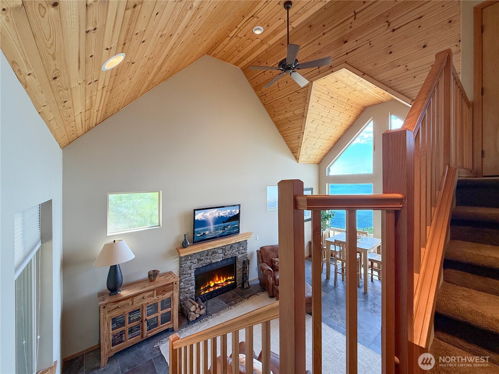 Slate floors and wood ceilings bring a natural feel.