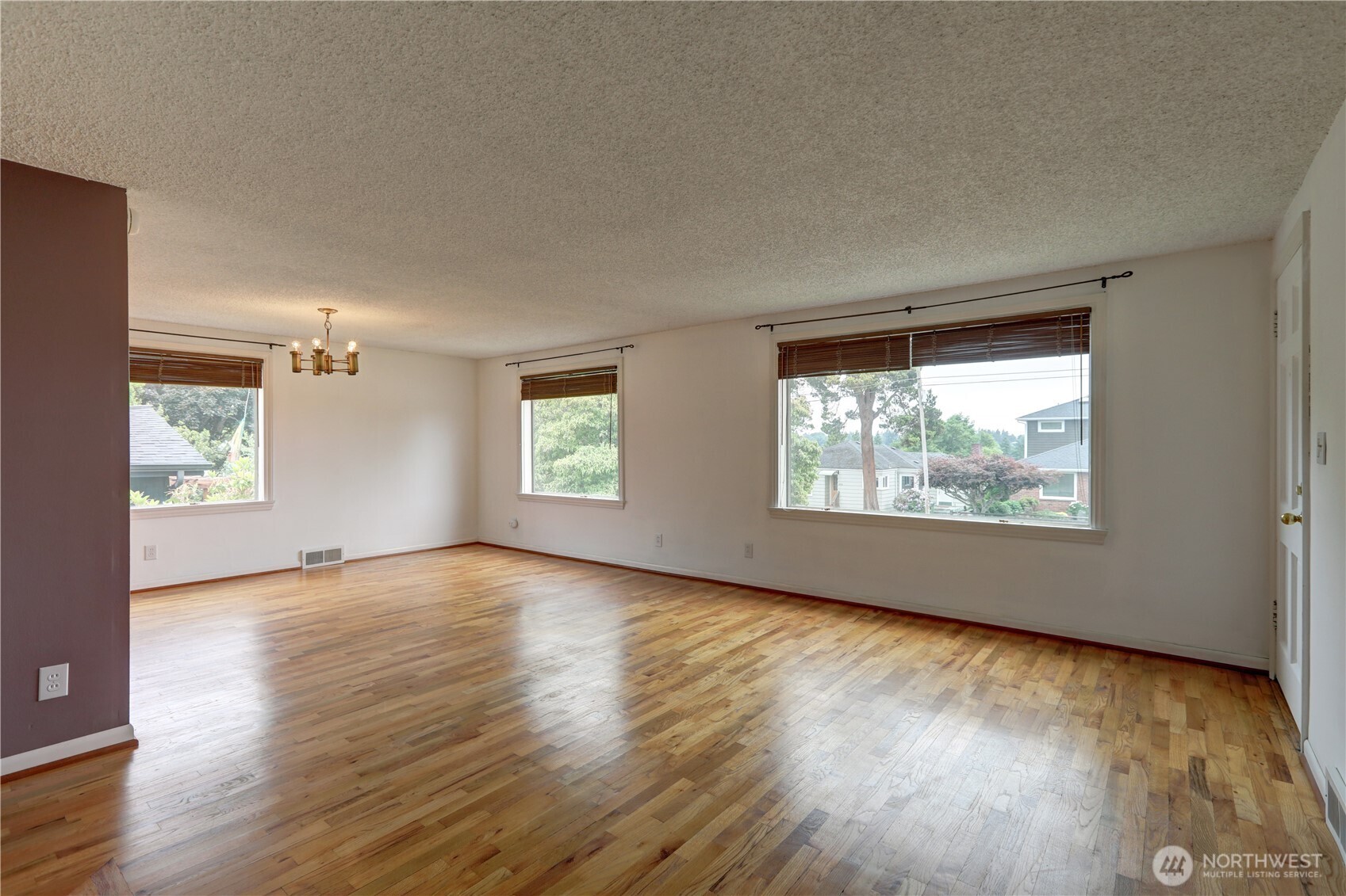 Large living room showered in natural light.