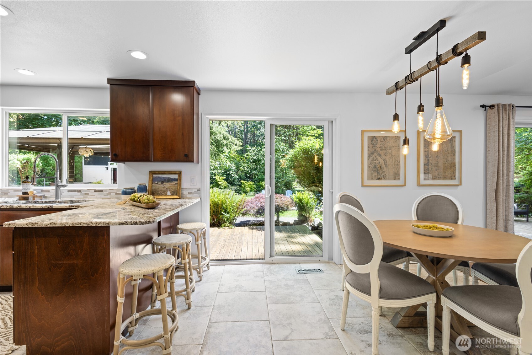 This home offers plenty of seating options—from casual island counter stools to a cozy breakfast nook and an elegant formal dining area. Wherever you choose to gather, there’s a spot for everyone.