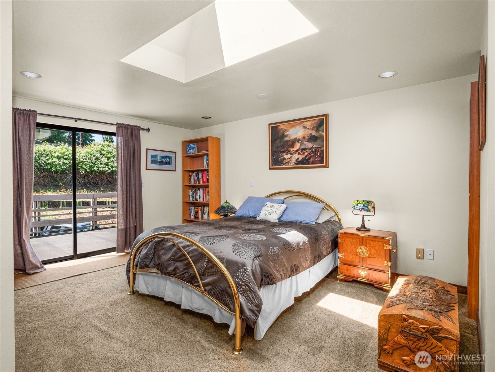 Upper bedroom with wet bar.