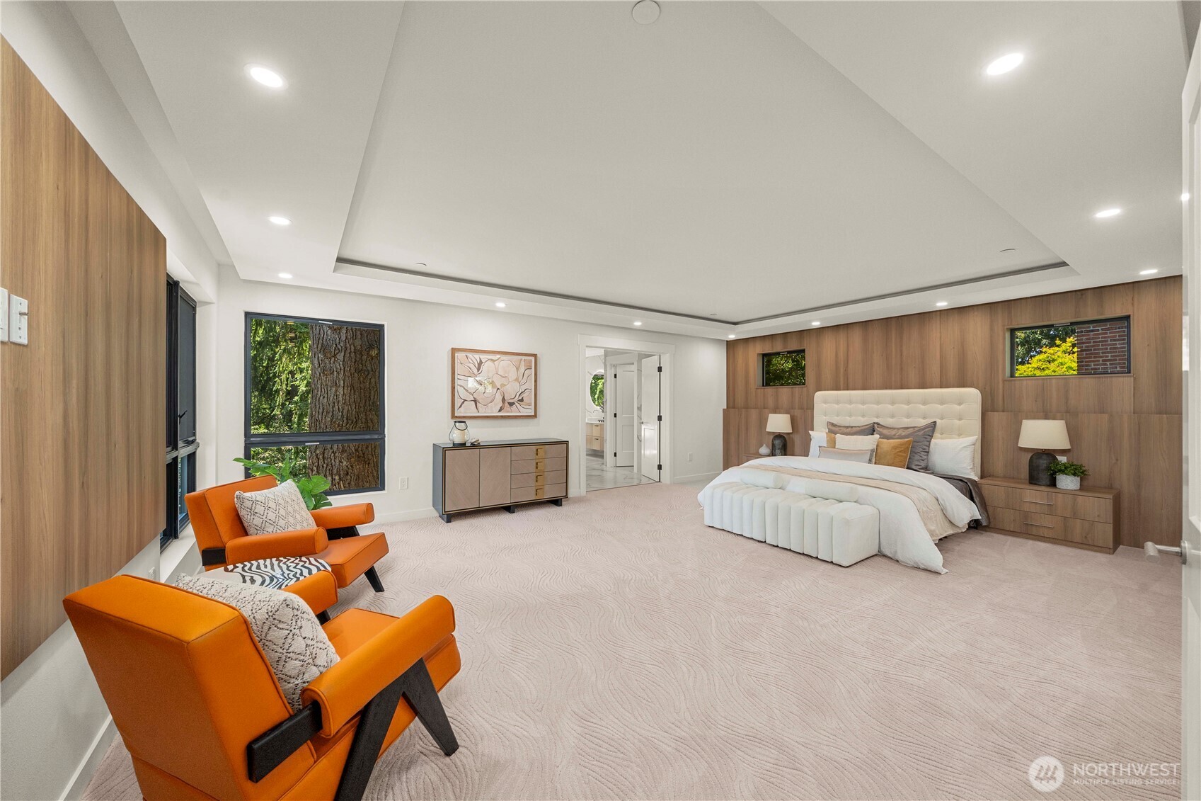 The master suite is a luxurious retreat, offering generous space, a walk-in closet, and a spa-inspired en-suite bath with high-end finishes.