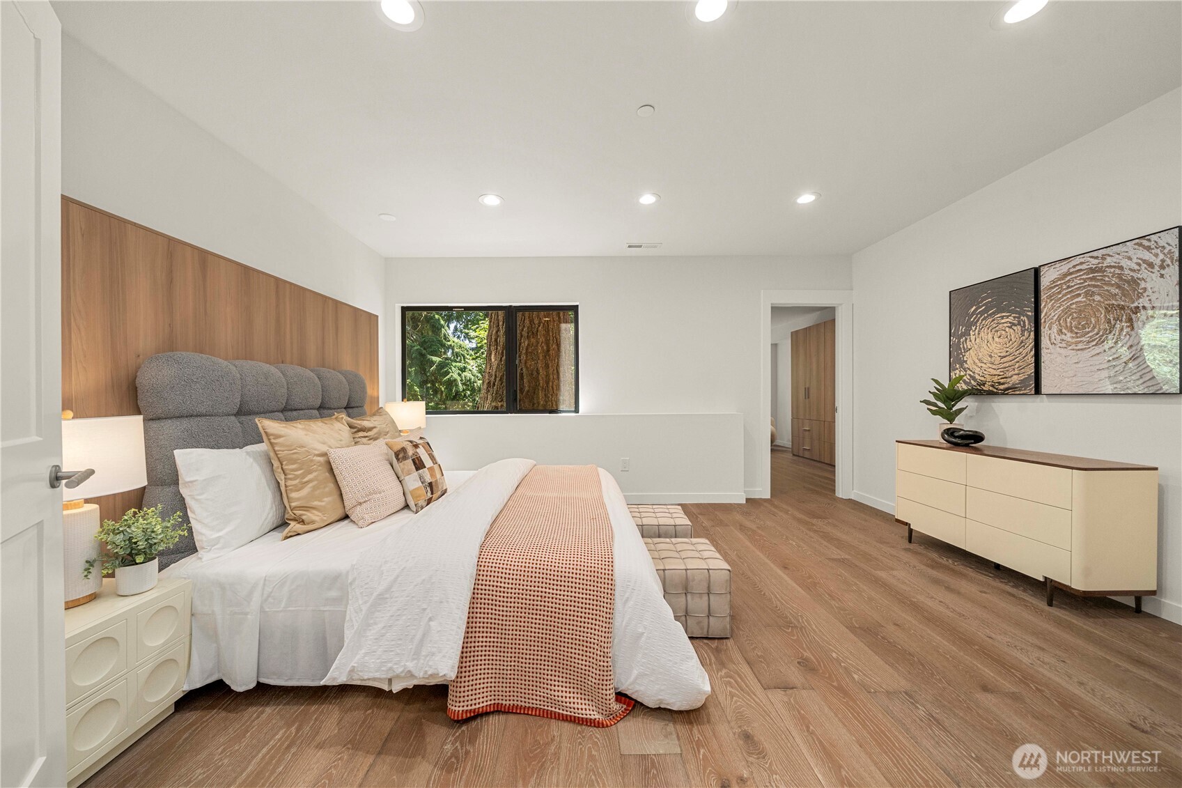 The fifth bedroom suite on the lower level offers exceptional privacy, complete with its own full bath—perfect for guests, extended family, or live-in help.