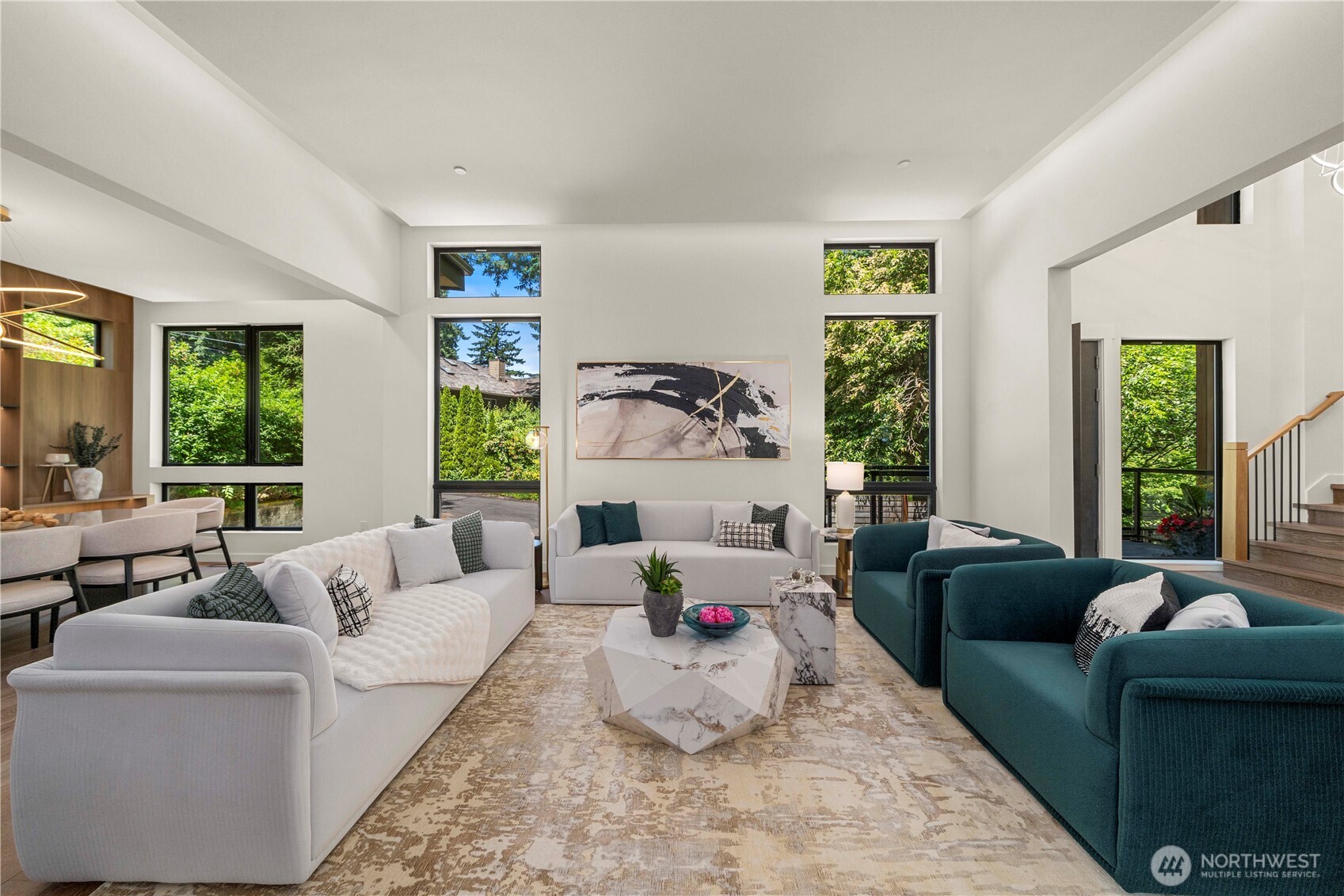 The expansive living area is designed for both grand entertaining and everyday comfort