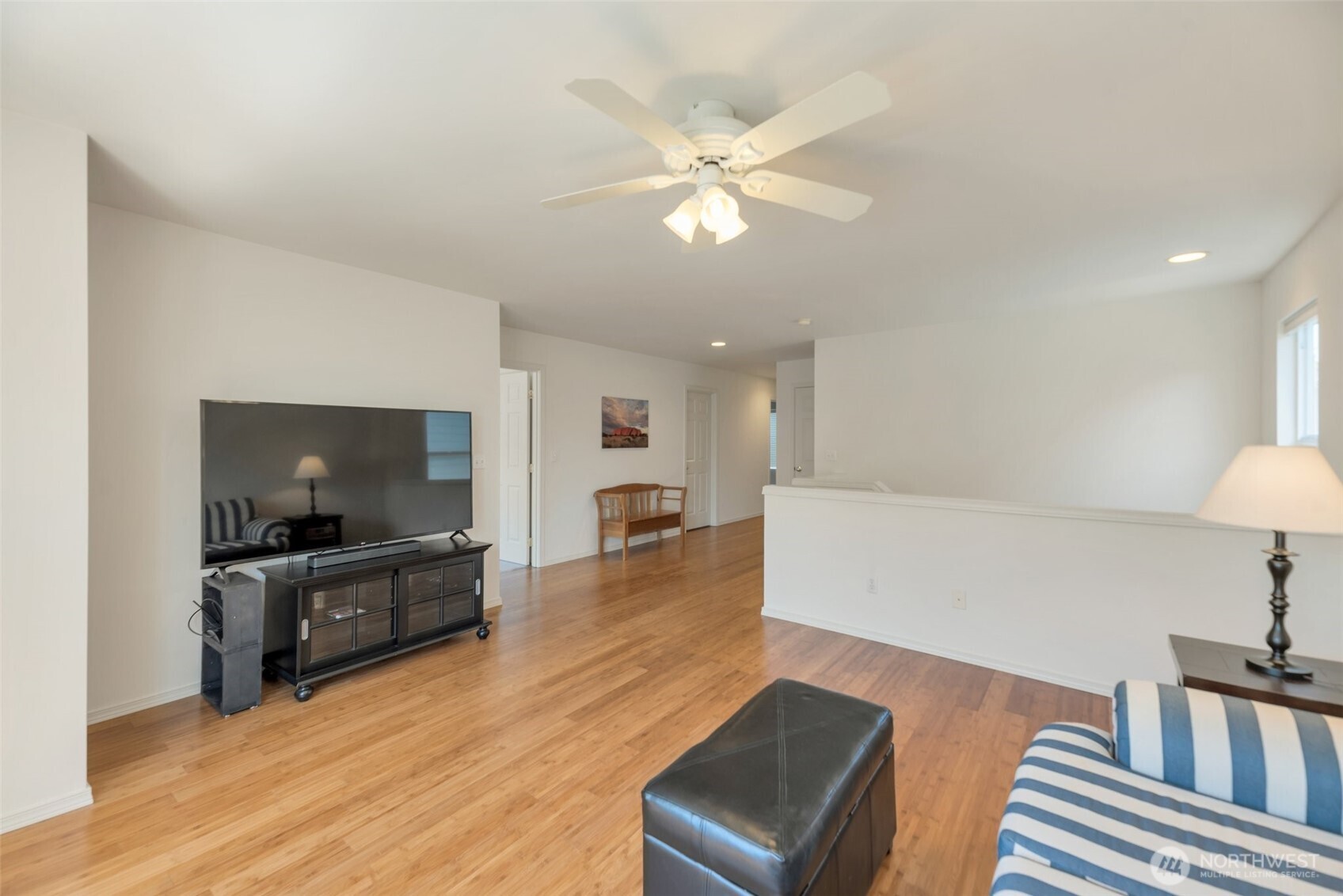 Upper floor loft open space, flex area. Could convert to another room or bedroom