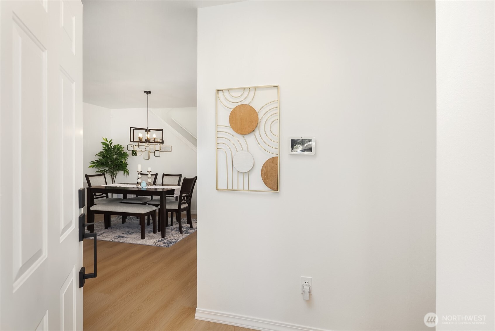 Entry Looking to Living Room & Dining Area