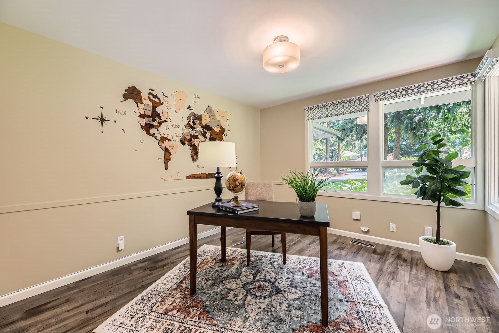 Light-filled main floor den or office, perfect as a work from home option or use as a 5th bedroom!
