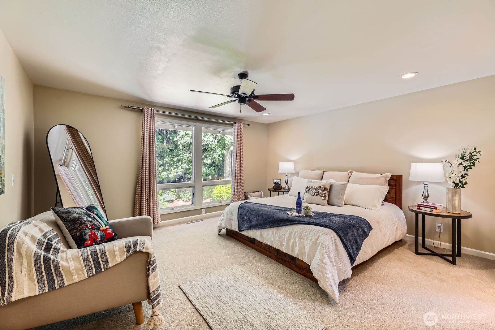 Primary bedroom retreat offers respite at the end of the day.