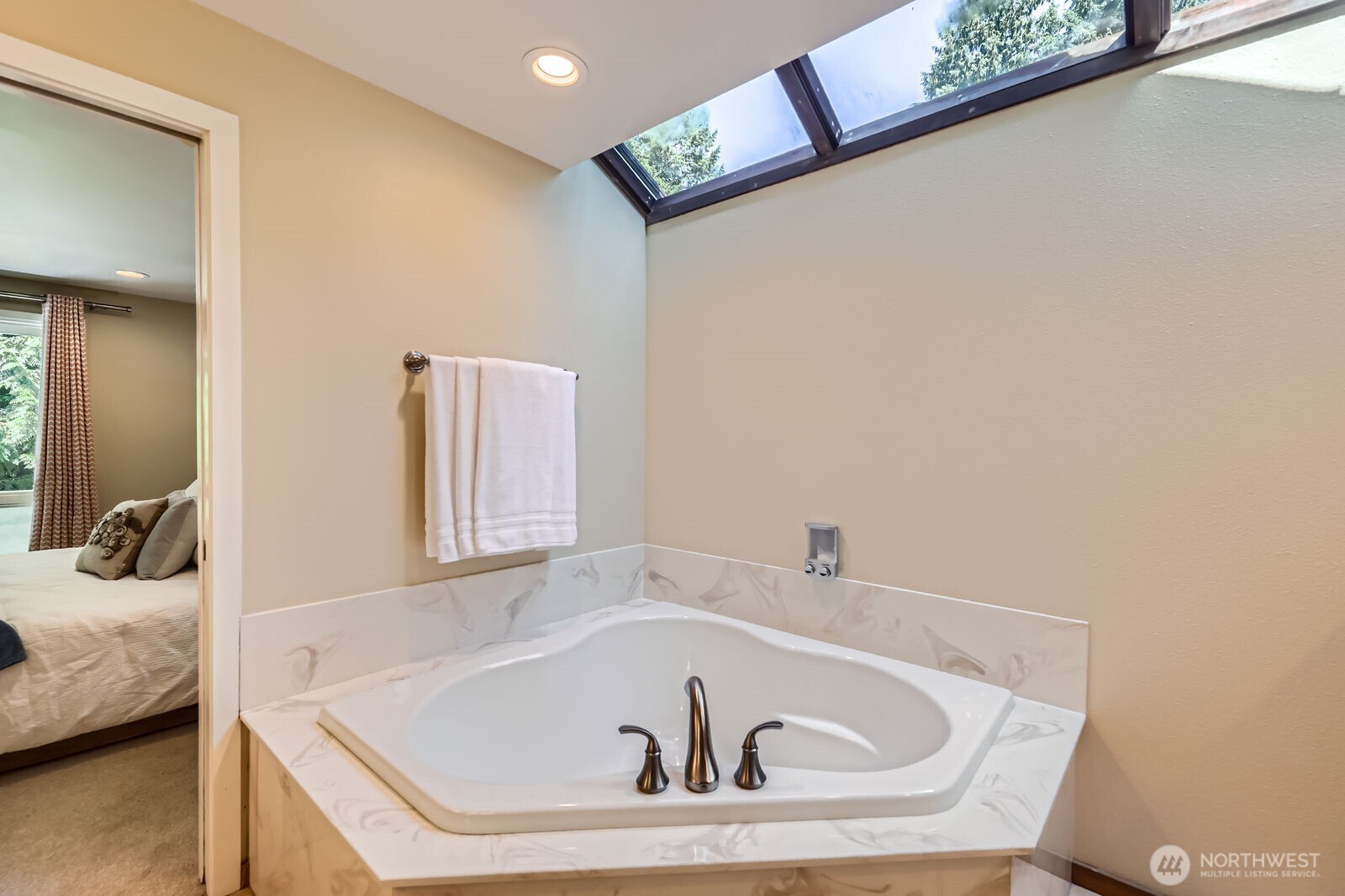 The soaking tub in the primary bath.