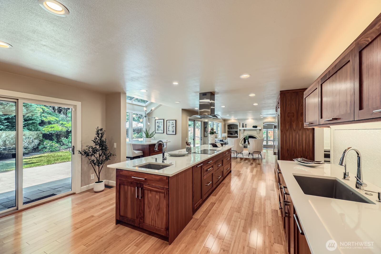 The kitchen is open to both the living room and the family room for easy flow gatherings.